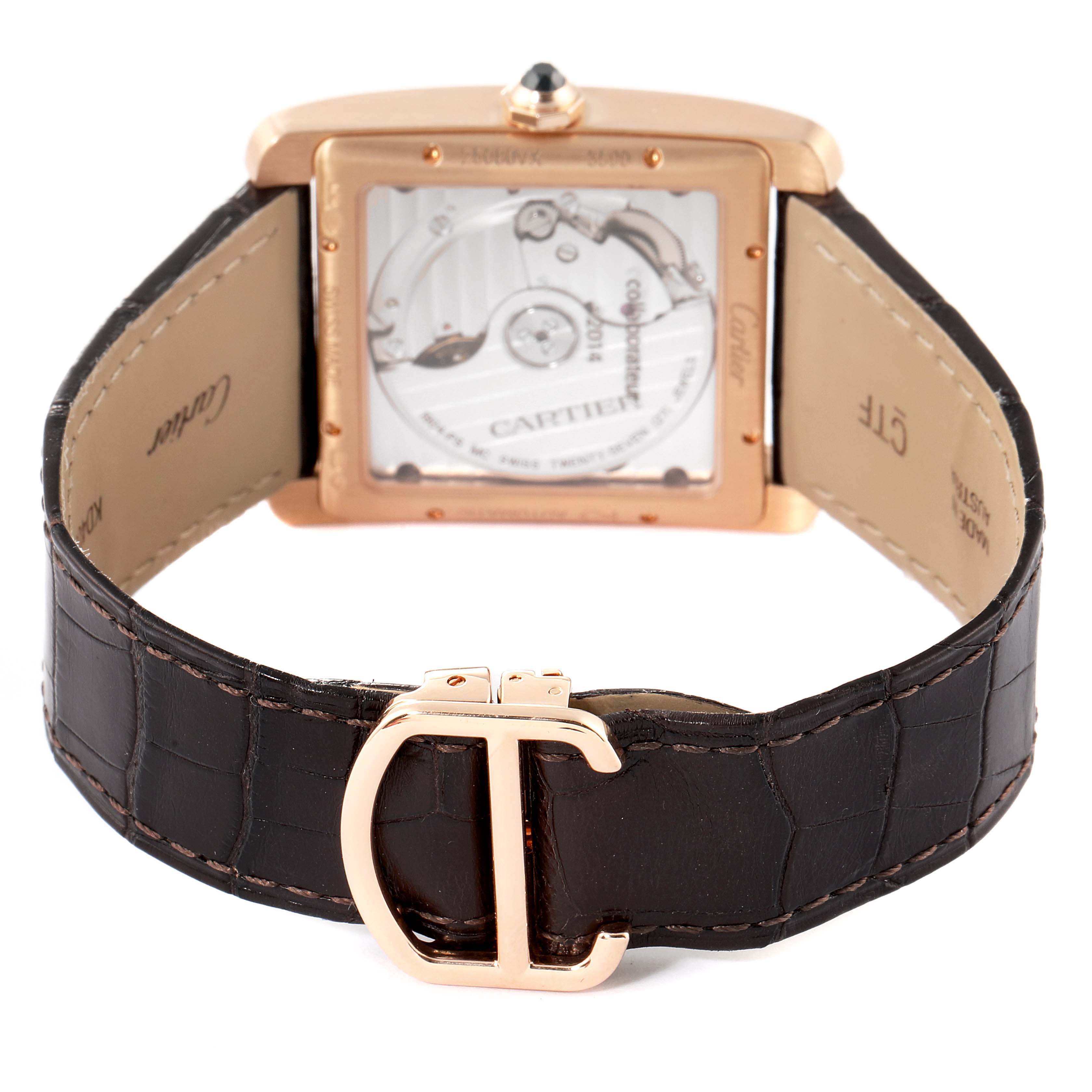 The image shows the back view of the Cartier Tank MC W5330001 Men
s Rose Gold Silver Dial W5330001 Men
s Rose Gold Silver Dial watch, highlighting its movement and leather strap with a rose gold buckle.