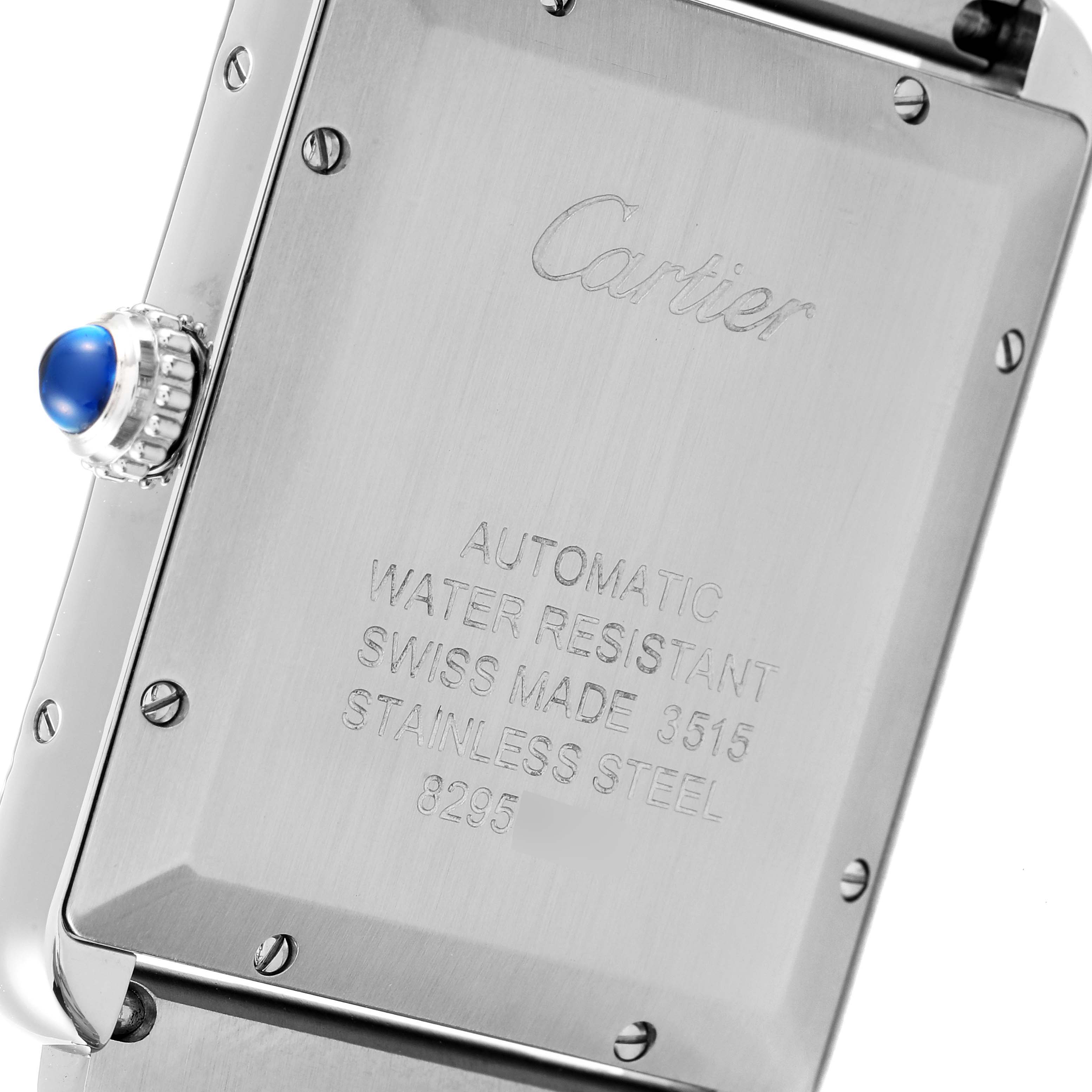 This image shows the back and side of the Cartier Tank Solo W5200028 Men's Stainless Steel Silver Dial W5200028 Men's Stainless Steel Silver Dial watch, highlighting the case back engravings and crown with a blue sapphire.