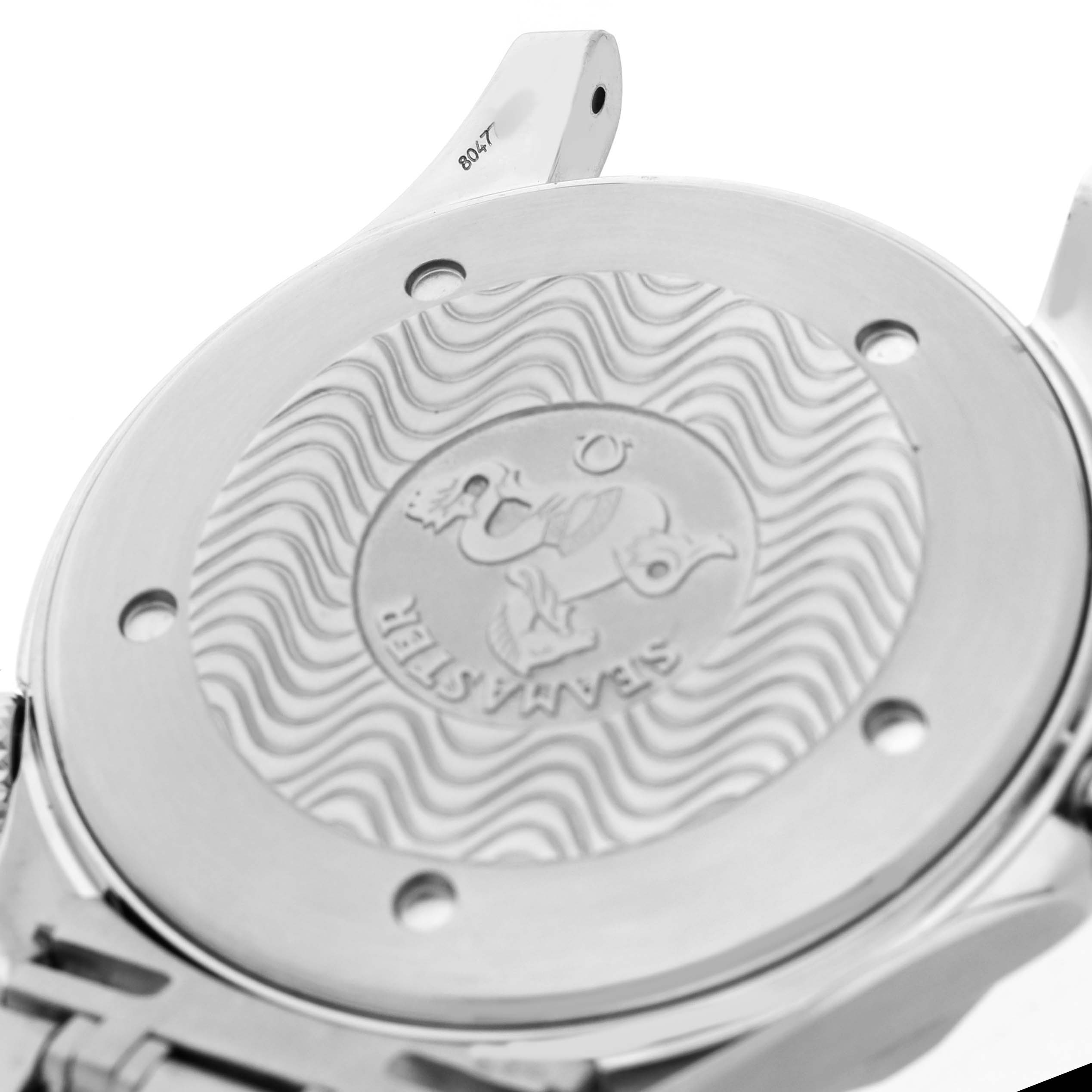 The image shows the back casing of an Omega Seamaster 2531.80.00 Men's Stainless Steel Blue Dial watch, highlighting the embossed logo and wave pattern.