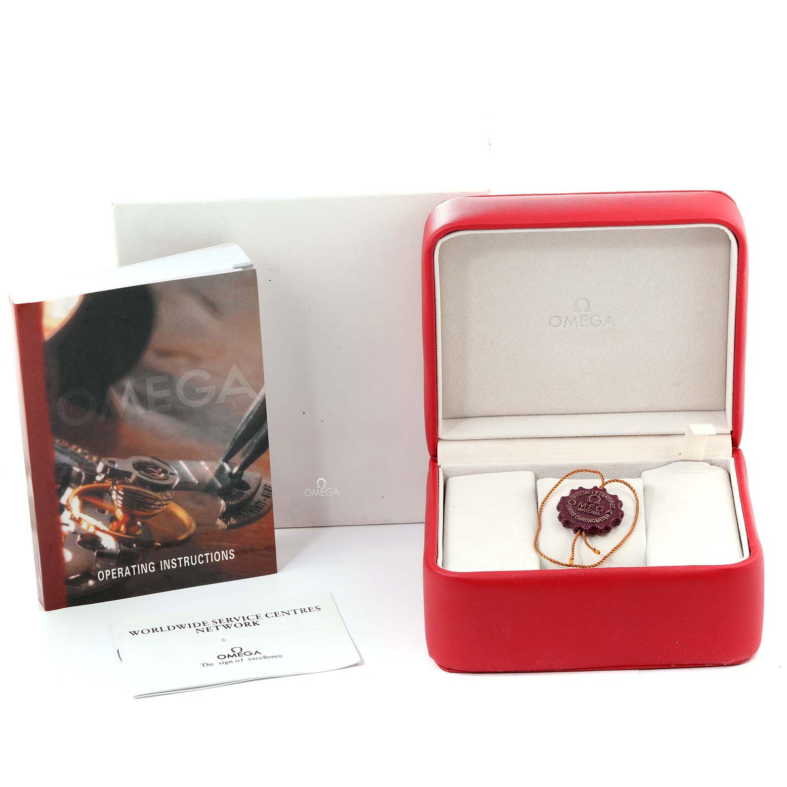 The image shows the Omega Seamaster 231.10.44.52.04.001 Men's Stainless Steel White Dial 231.10.44.52.04.001 Men's Stainless Steel White Dial watch accessories including its red box, operating instructions, and a certificate booklet.