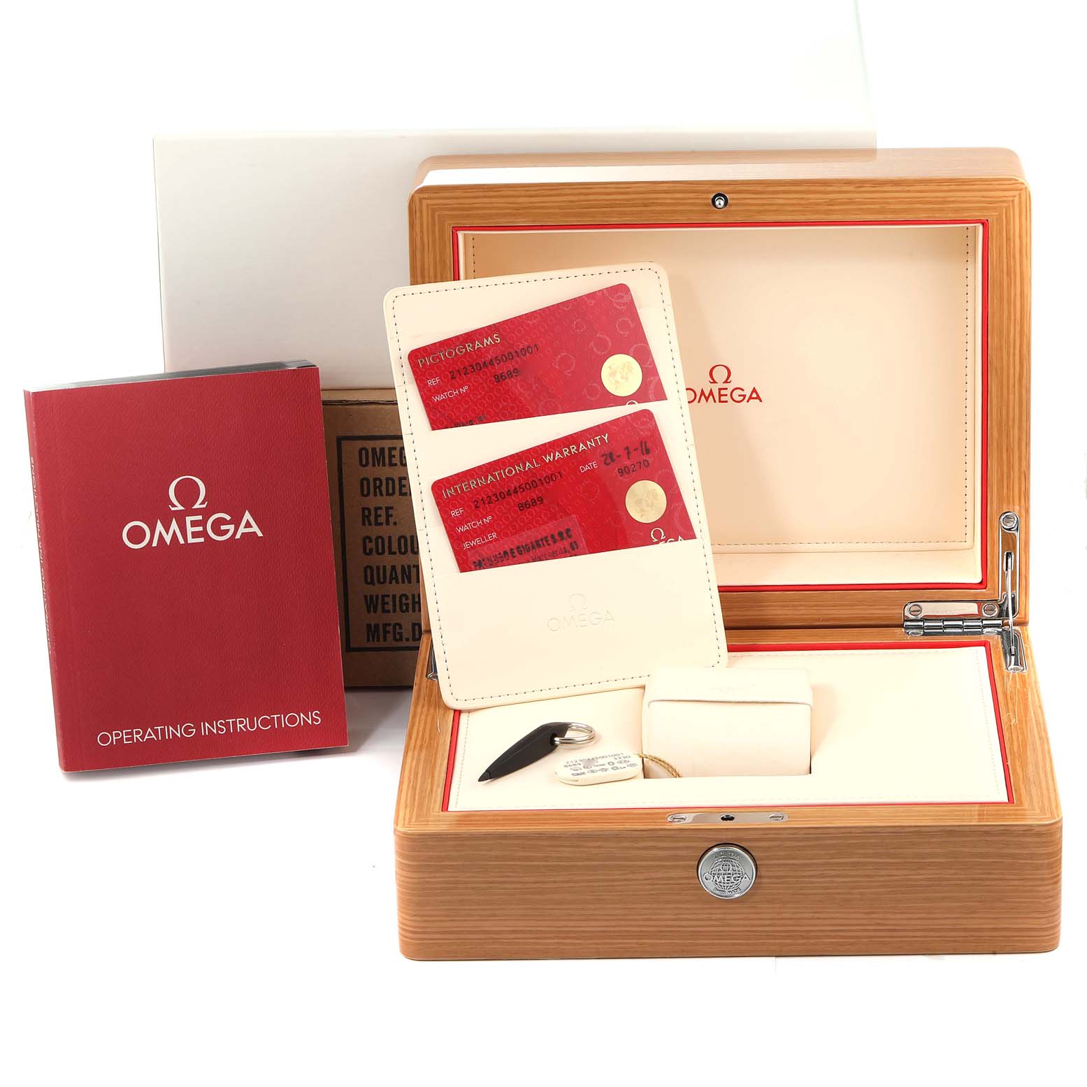 The image shows the Omega Seamaster 212.30.44.50.01.001 Men's Stainless Steel Black Dial 212.30.44.50.01.001 Men's Stainless Steel Black Dial watch box, warranty cards, operating instructions, and accessories from a front angle.