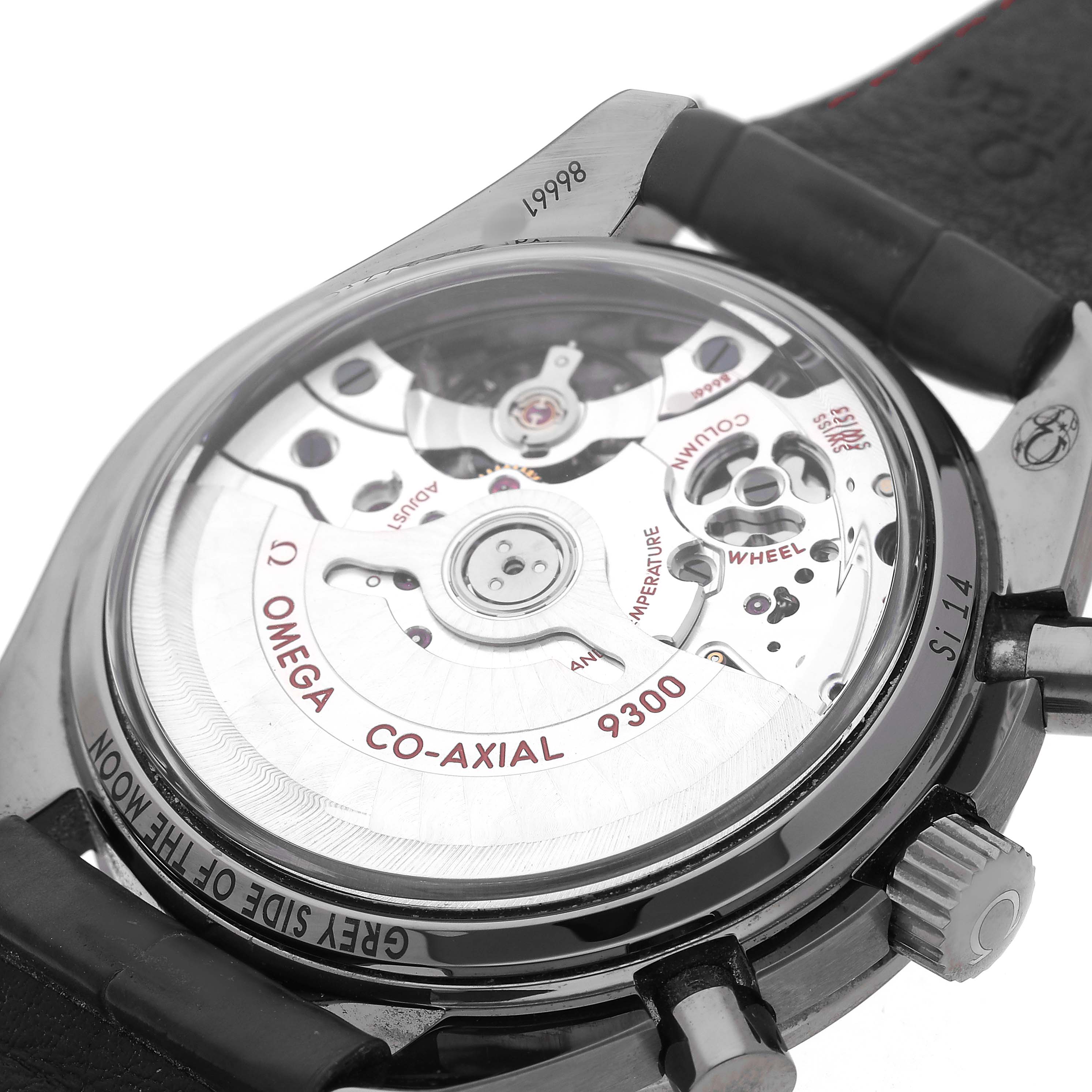 The image shows the back view of an Omega Speedmaster 311.93.44.51.99.002 Men's Ceramic Grey Dial, highlighting its Co-Axial 9300 movement.