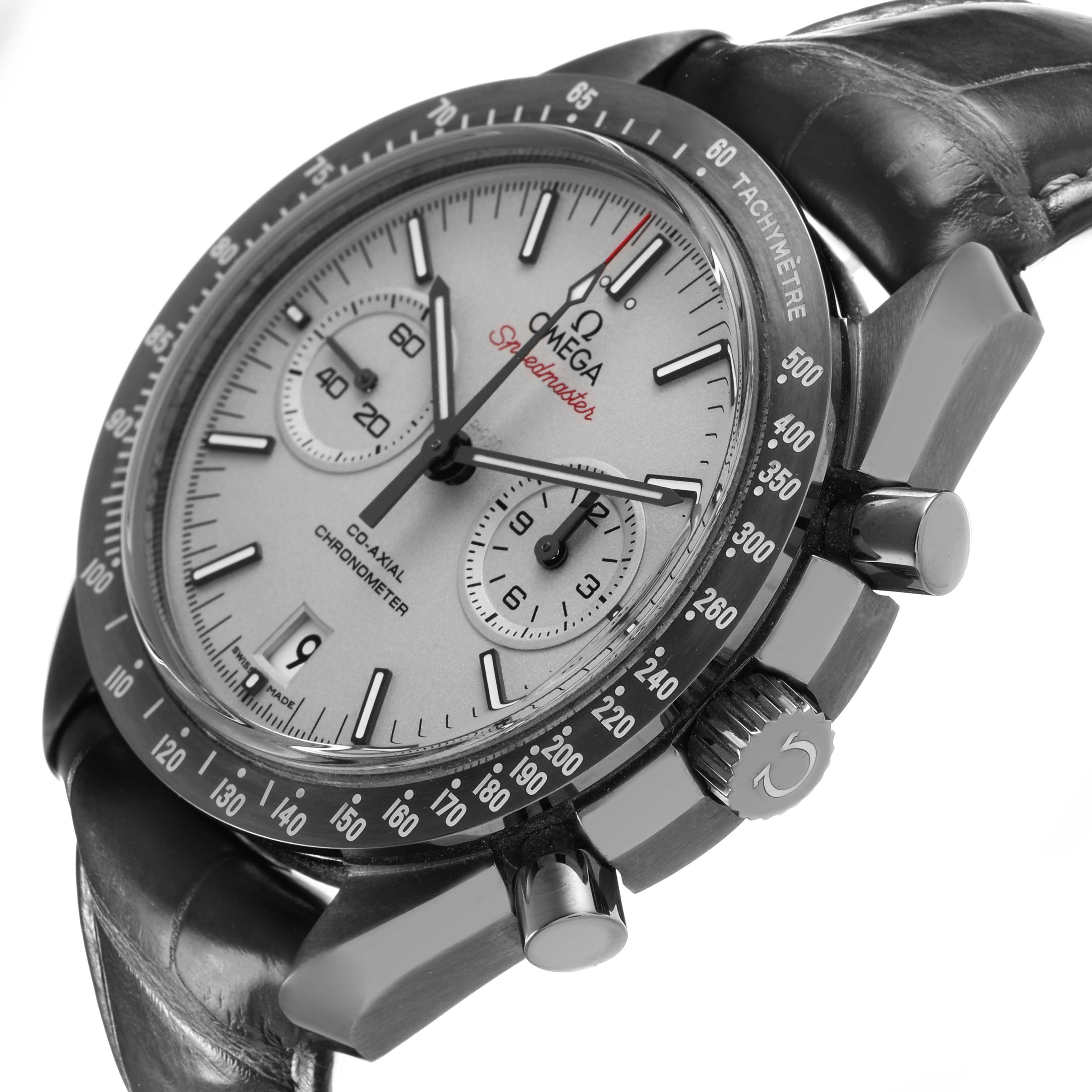 The Omega Speedmaster 311.93.44.51.99.002 Men's Ceramic Grey Dial watch is shown at a tilted angle, highlighting the face, tachymeter bezel, pushers, and crown.