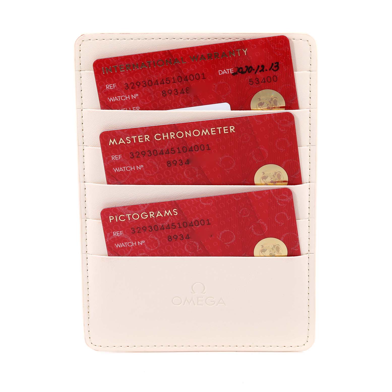 This image shows the warranty and certification cards for the Omega Speedmaster 329.30.44.51.04.001 Men
s Stainless Steel White Dial 329.30.44.51.04.001 Men
s Stainless Steel White Dial model in a white cardholder.