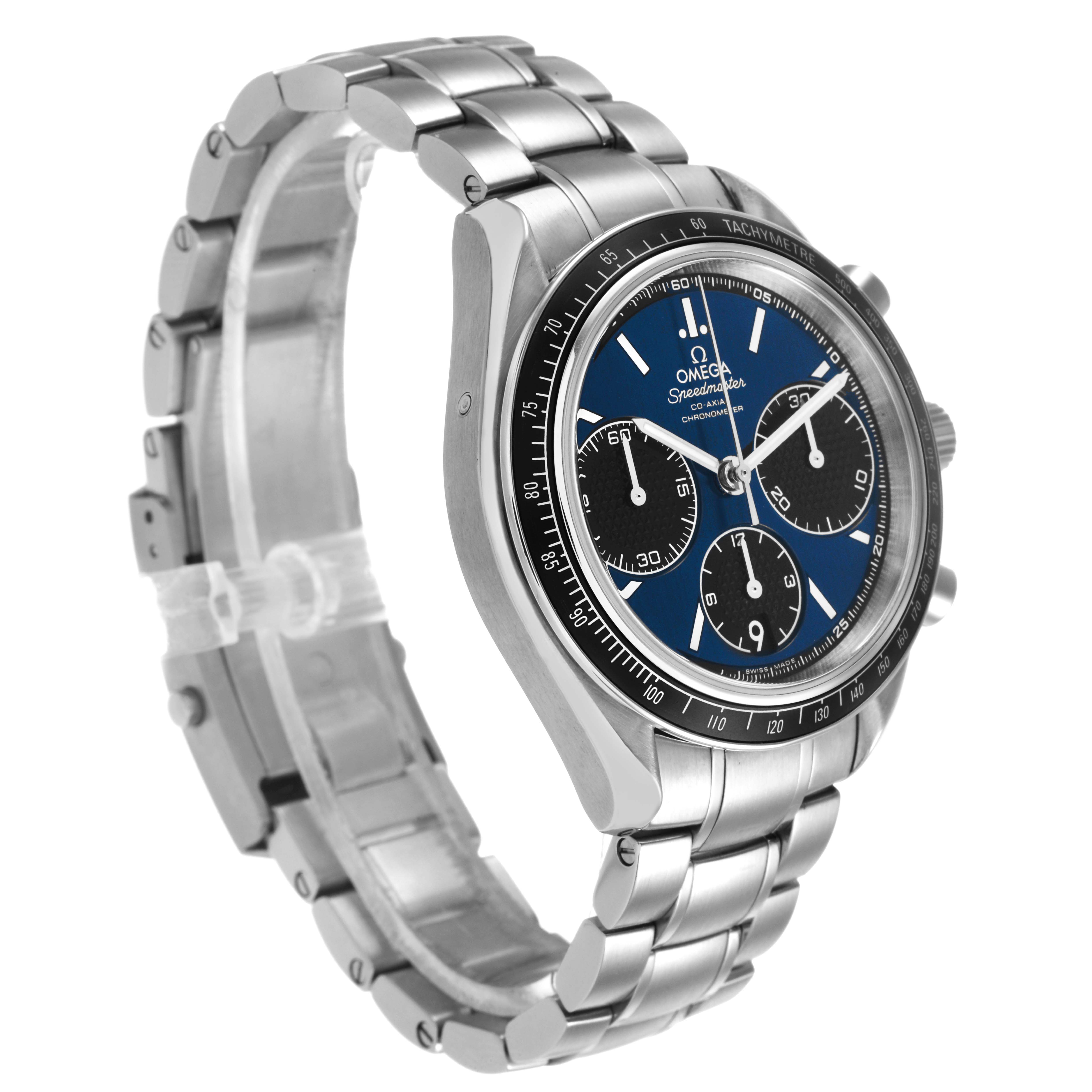 The Omega Speedmaster 326.30.40.50.03.001 Men's Stainless Steel Blue Dial watch is shown at a three-quarter angle, highlighting the case, bracelet, dial, and tachymeter bezel.
