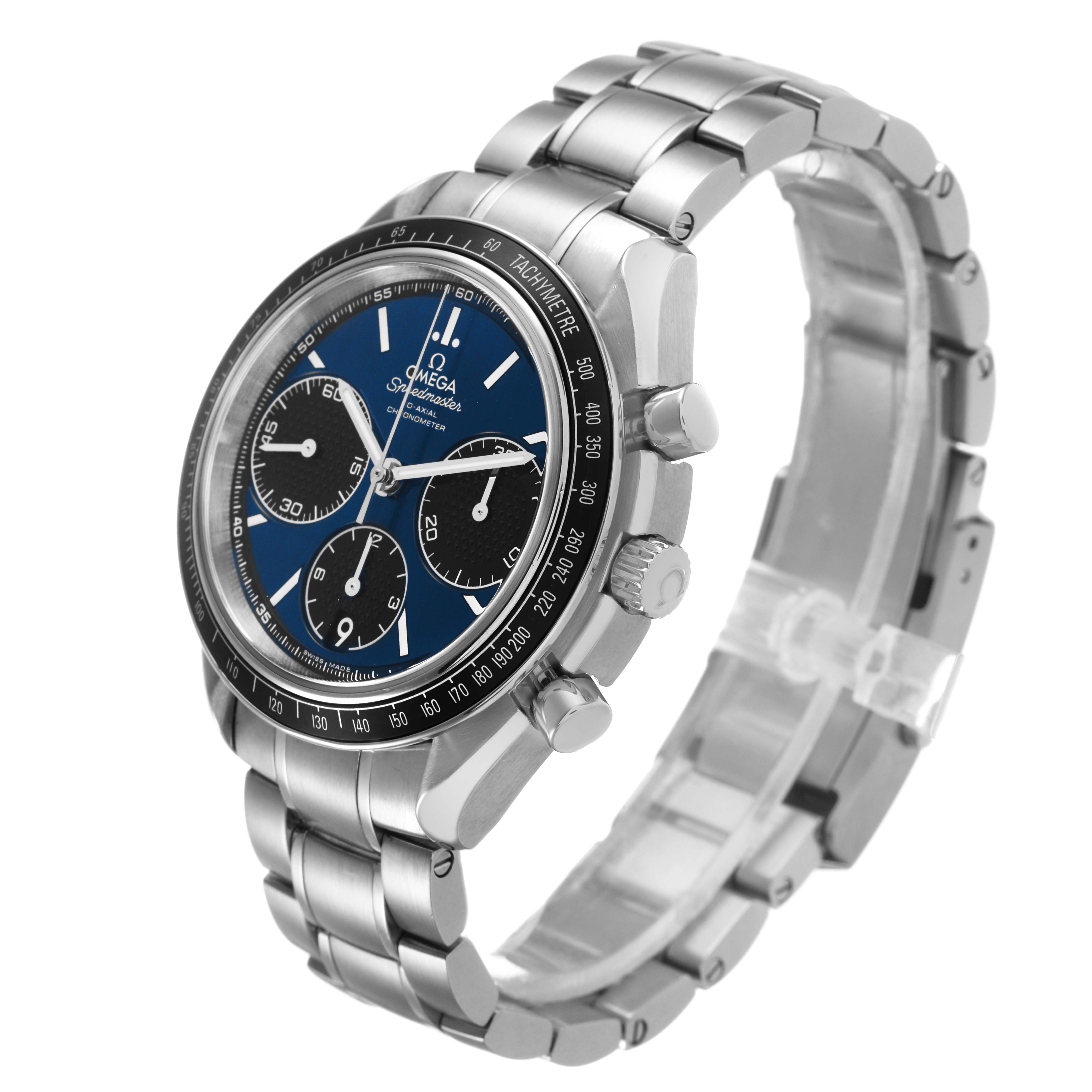 The Omega Speedmaster 326.30.40.50.03.001 Men's Stainless Steel Blue Dial watch is shown at an oblique angle, highlighting the face, bezel, and bracelet.
