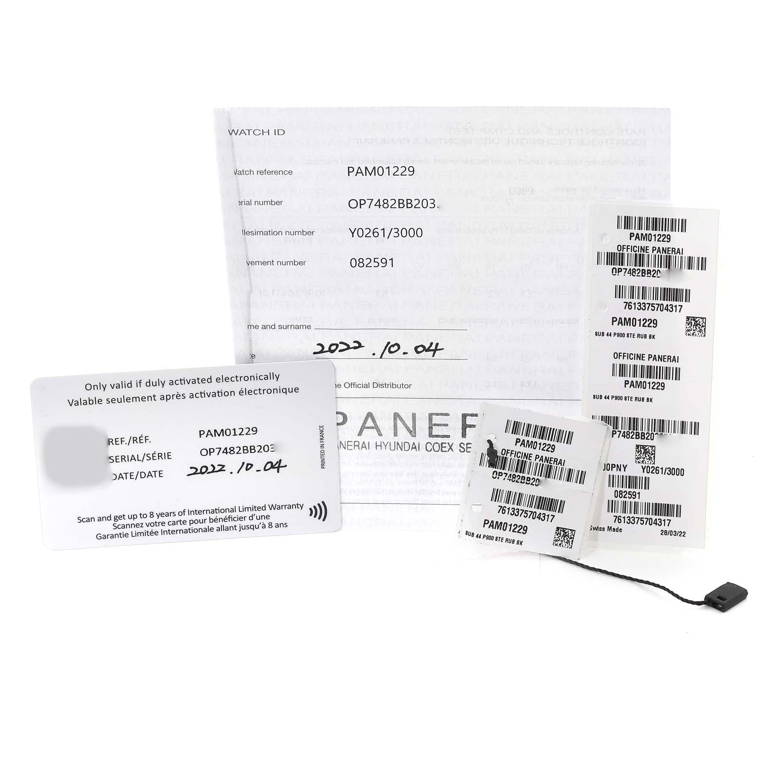 The image shows documentation and tags for the Panerai Submersible PAM01229 Men's Stainless Steel Black Dial PAM01229 Men's Stainless Steel Black Dial model PAM01229.