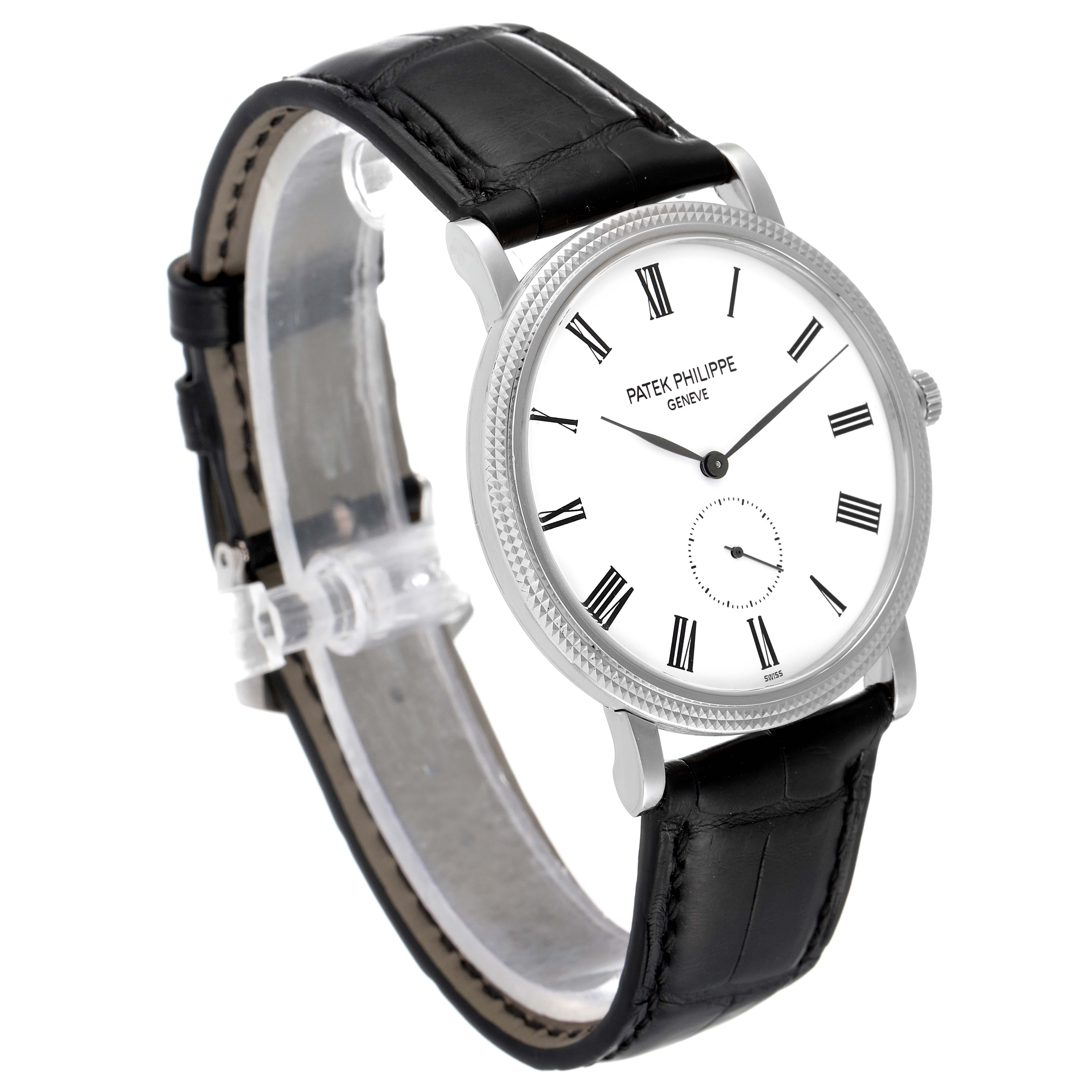 This image shows a Patek Philippe Calatrava 5119G Men's White Gold White Dial 5119G Men's White Gold White Dial watch at a three-quarter angle, highlighting its face, bezel, and black leather strap.