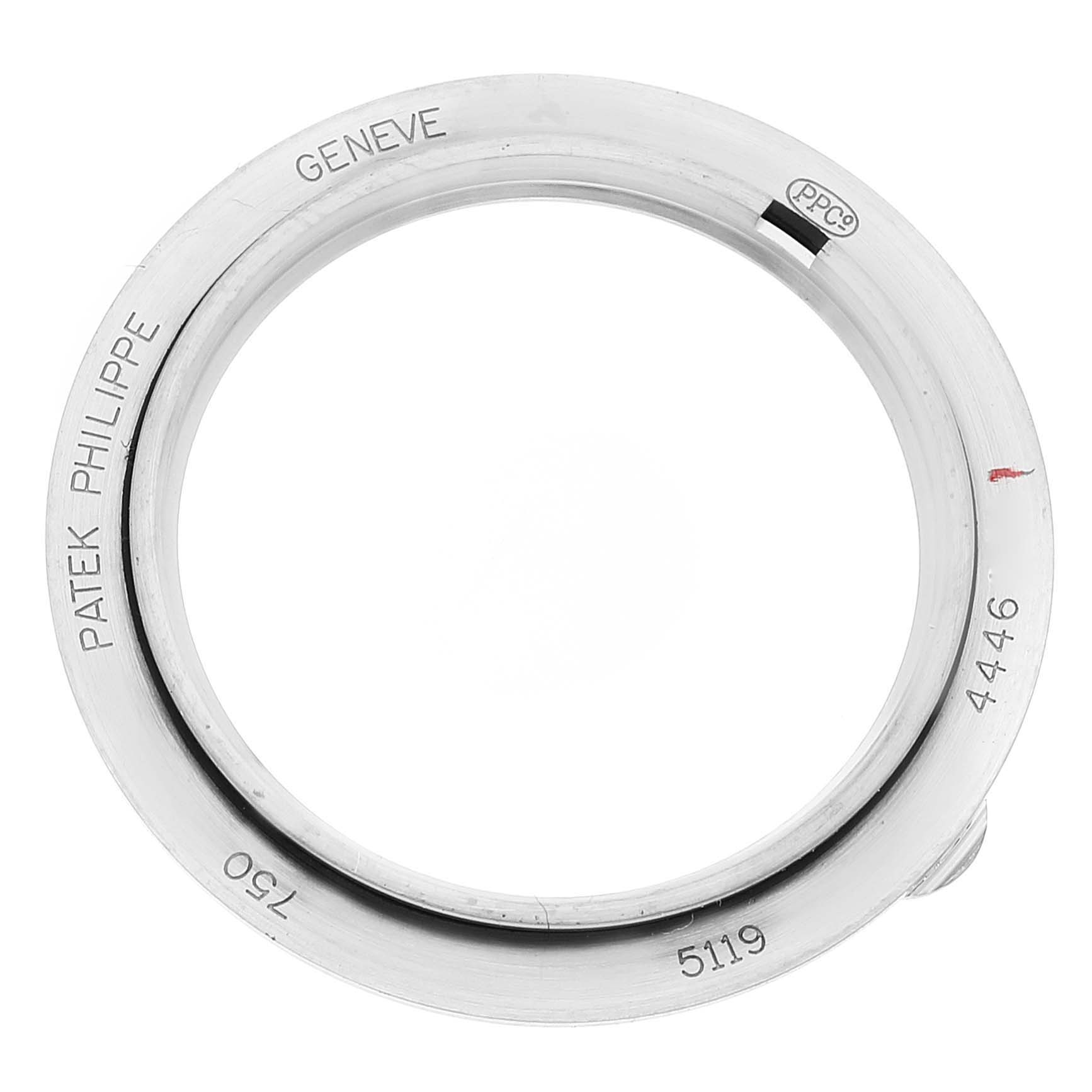 The image shows the bezel of a Patek Philippe Calatrava 5119G Men's White Gold White Dial 5119G Men's White Gold White Dial watch, viewed from above.