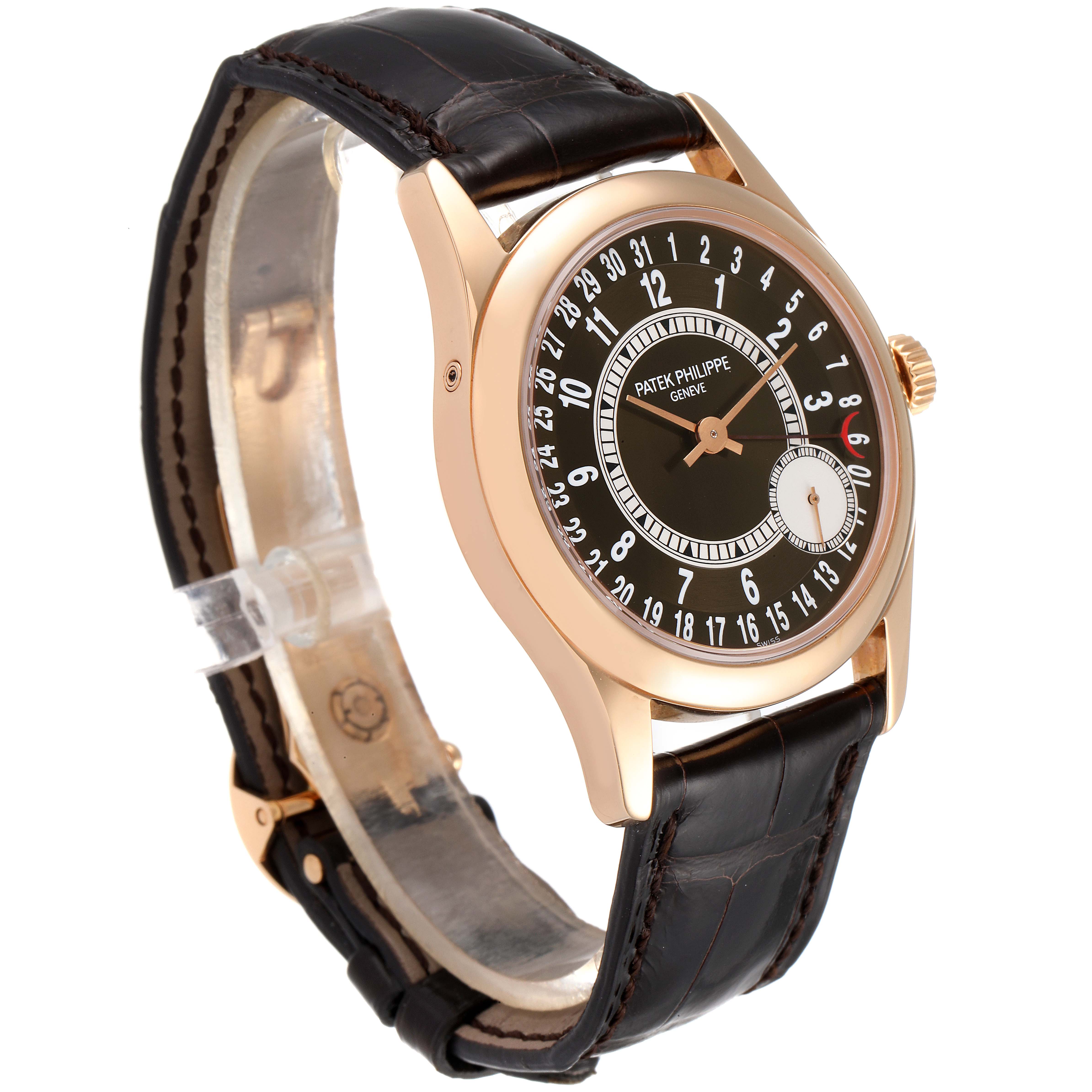The image shows a side angle of the Patek Philippe Calatrava 6000R Men's Rose Gold Brown Dial 6000R Men's Rose Gold Brown Dial watch, highlighting the watch face, crown, and leather strap.