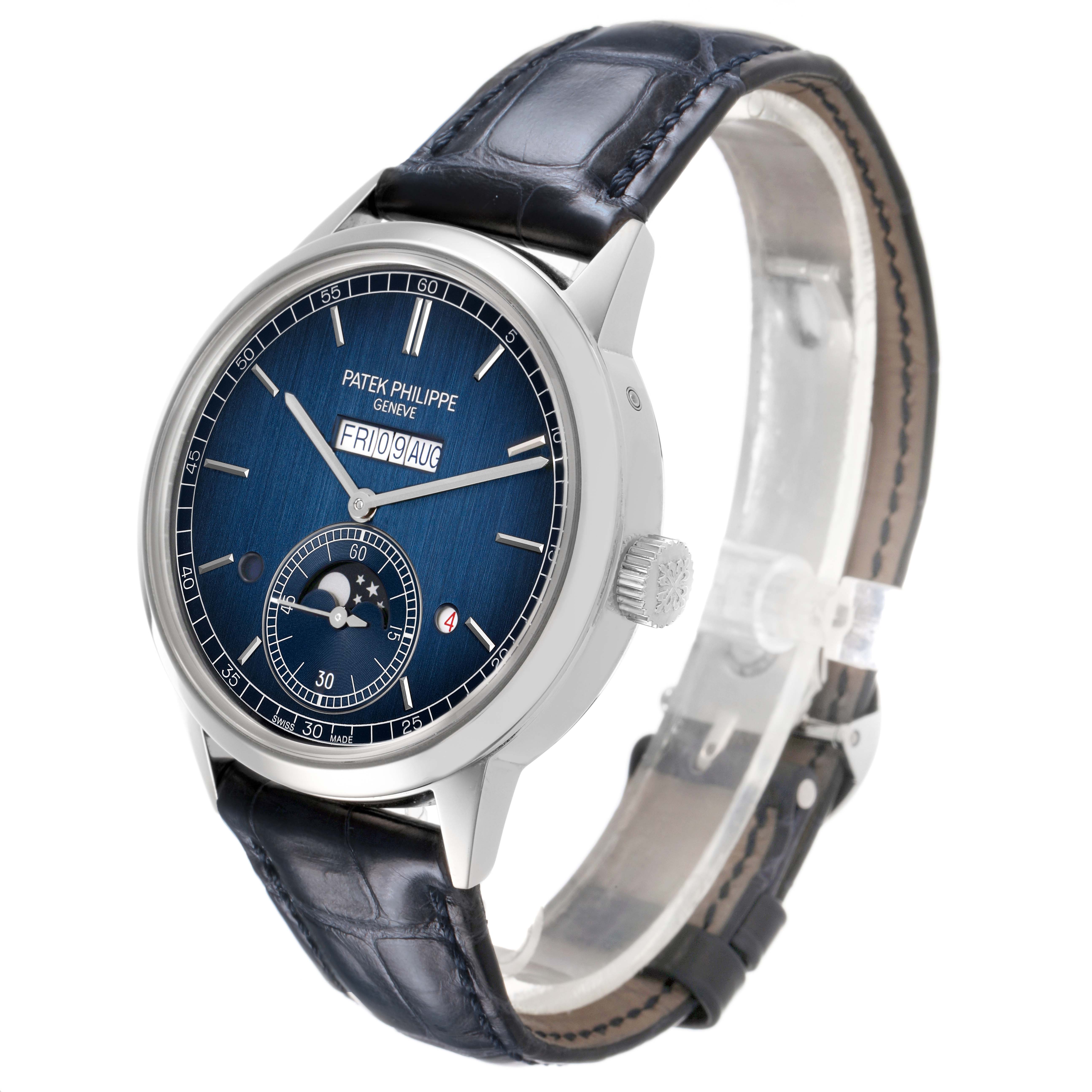 The Patek Philippe Complications 5236P-001 Men's Platinum Blue Dial watch is shown at a three-quarter angle, displaying the face, case, and strap.