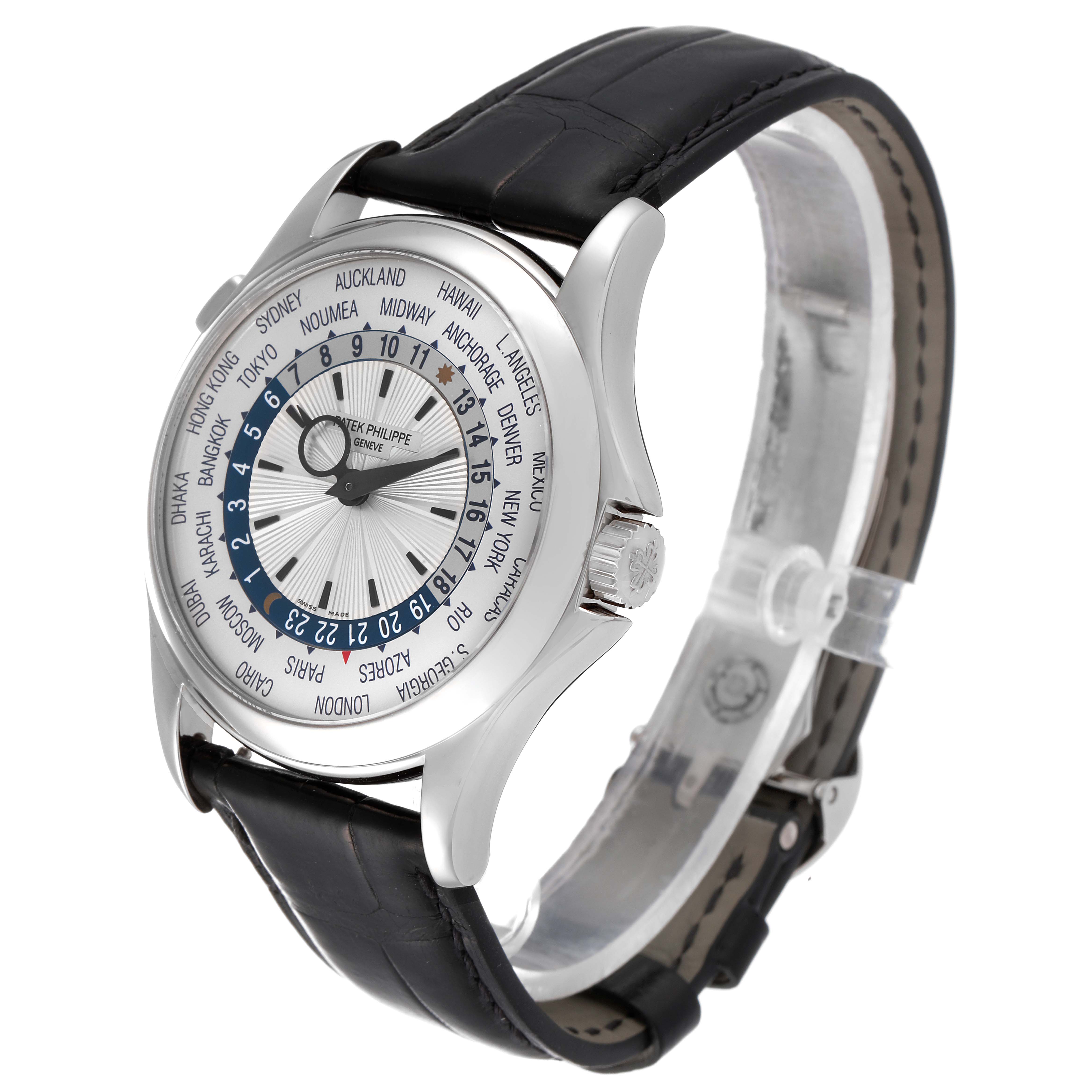 The image shows a Patek Philippe Complications 5130G-019 Men's White Gold Silver Dial 5130G-019 Men's White Gold Silver Dial model watch with a side and front angle view, displaying the dial and leather strap.