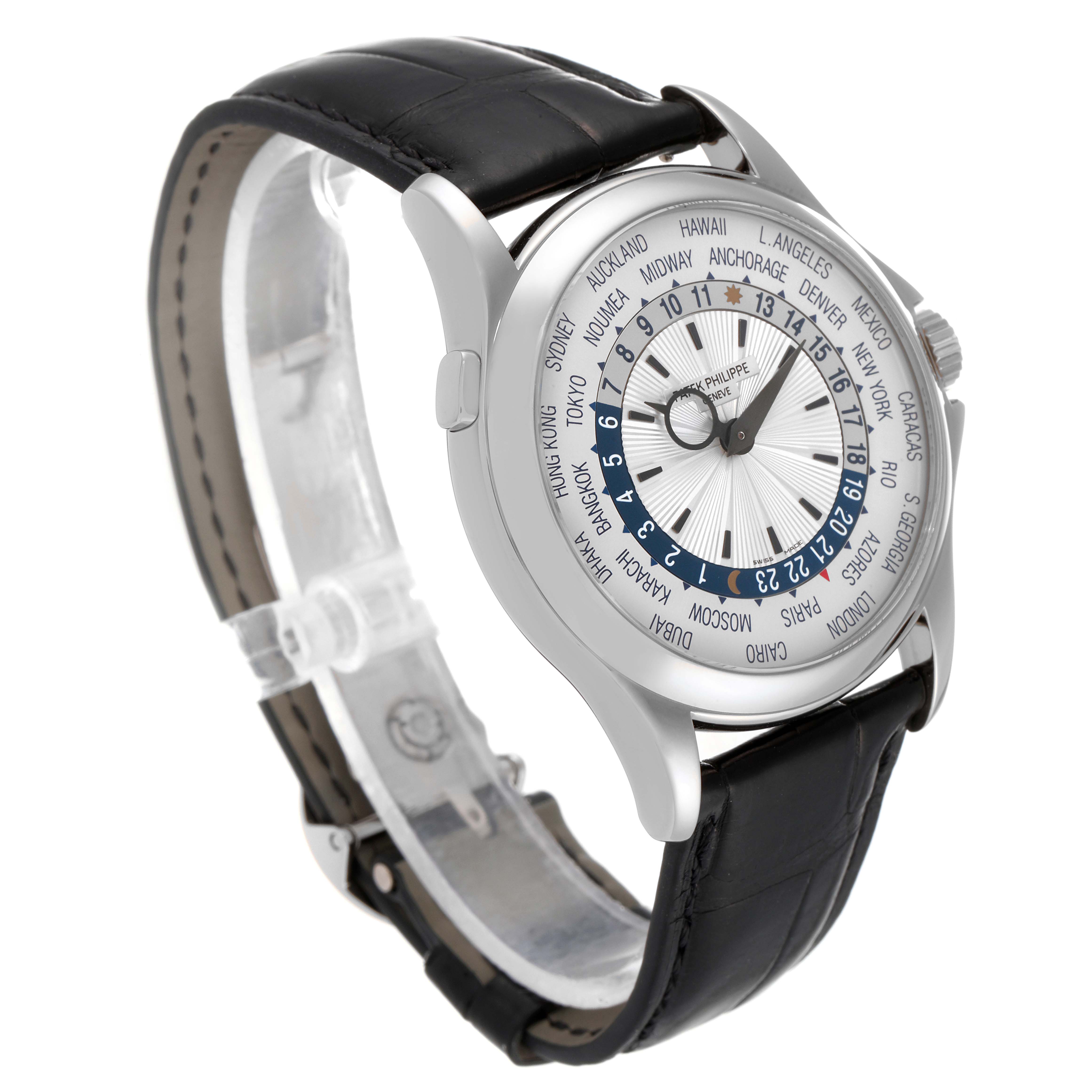 The image shows a side angle view of a Patek Philippe Complications 5130G-019 Men's White Gold Silver Dial 5130G-019 Men's White Gold Silver Dial model watch, highlighting its face, bezel, and black leather strap.