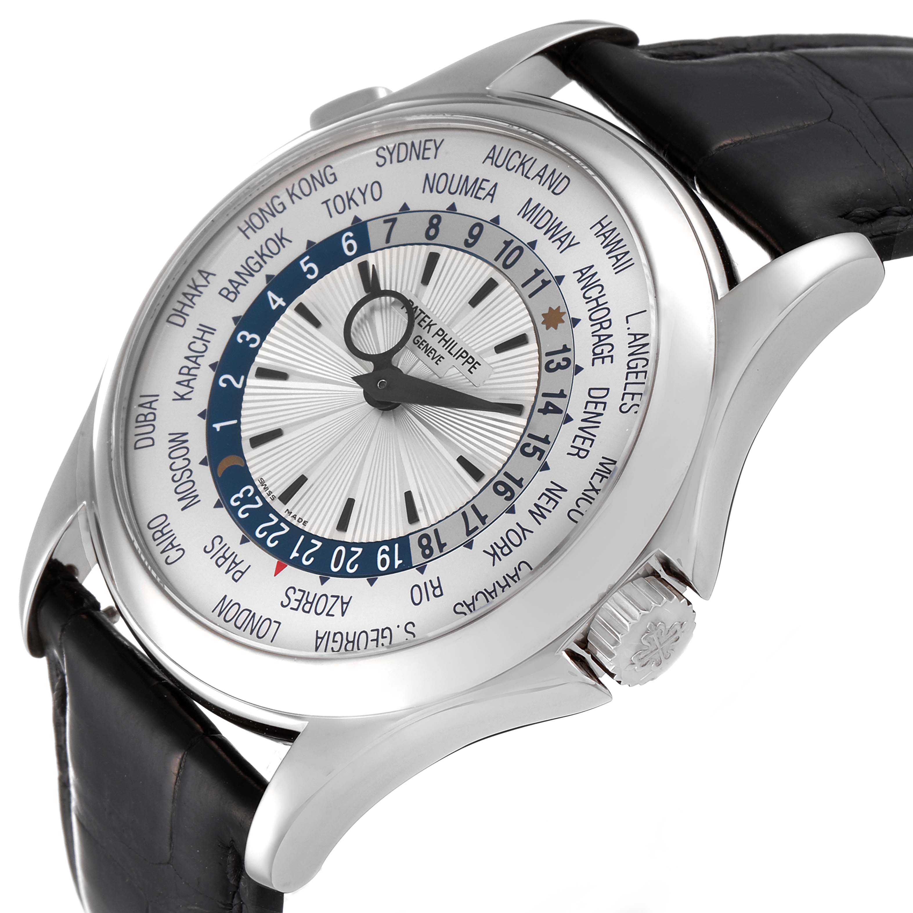 The image shows a side and front view of a Patek Philippe Complications 5130G-019 Men's White Gold Silver Dial 5130G-019 Men's White Gold Silver Dial watch, highlighting its world time dial and black leather strap.
