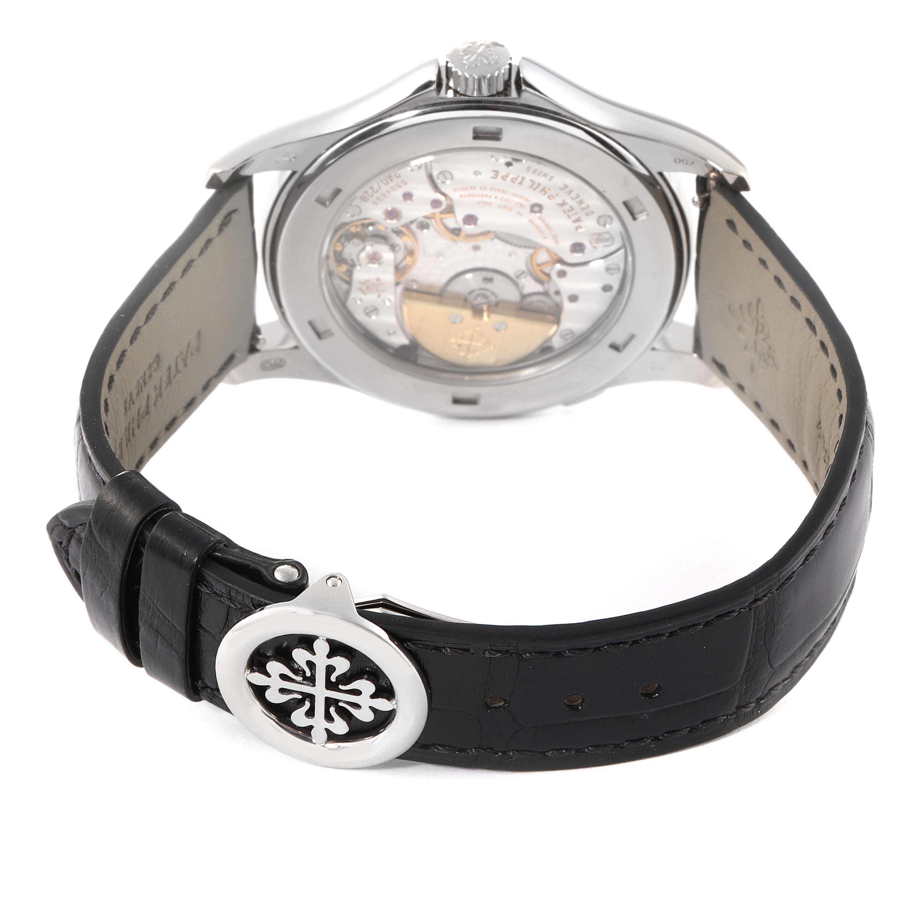 This image shows the back of the Patek Philippe Complications 5130G-019 Men's White Gold Silver Dial 5130G-019 Men's White Gold Silver Dial watch, highlighting the movement and clasp.