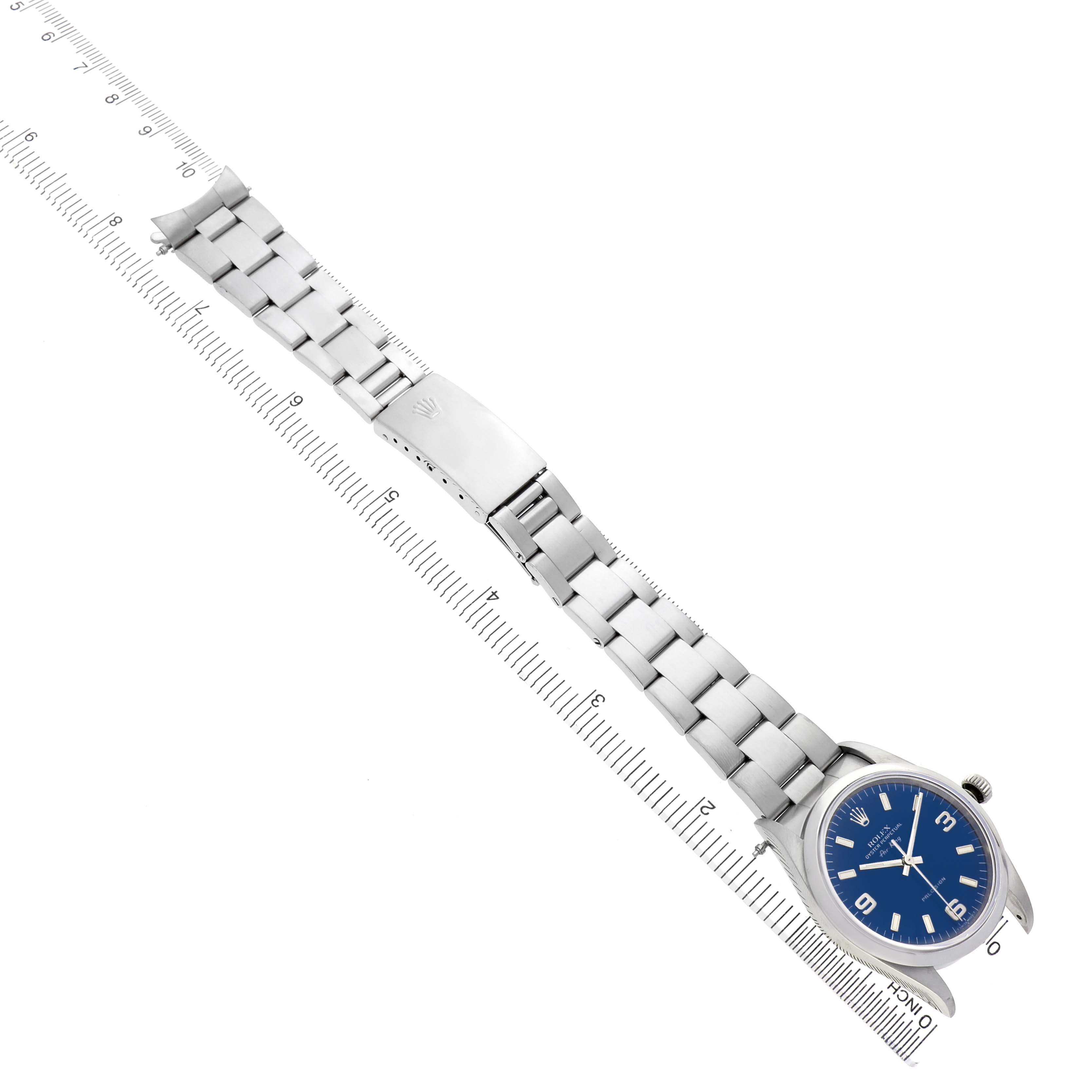 The Rolex Air-King 14000 Men's Stainless Steel Blue Dial watch is shown from a top-down angle, highlighting the face, bracelet, and clasp.