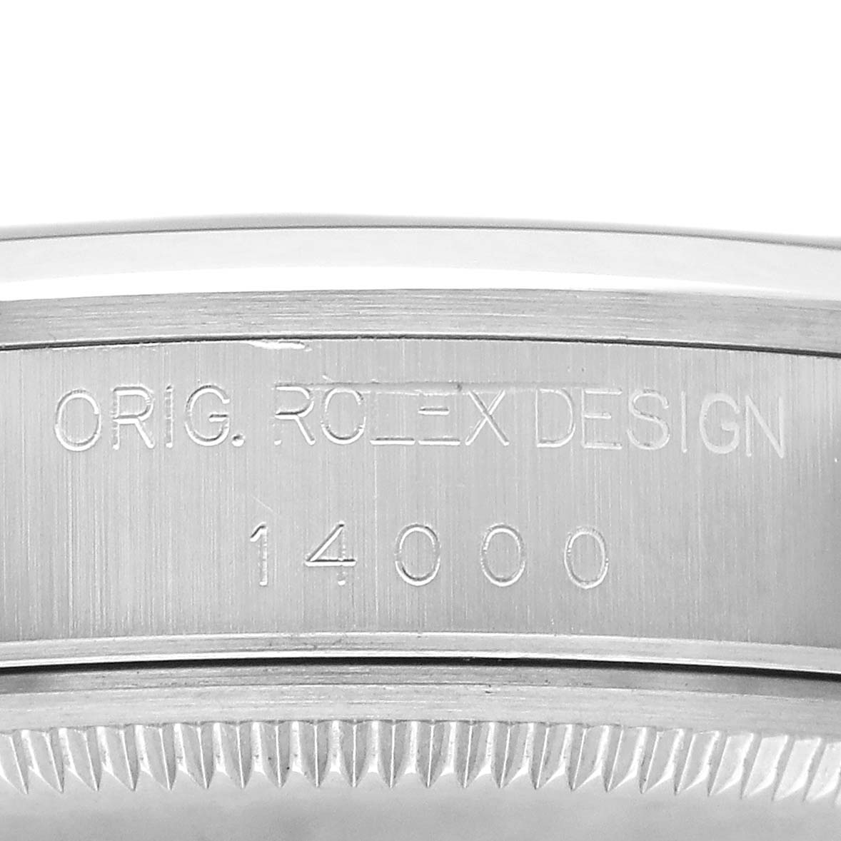 The image shows the engraved case edge of a Rolex Air-King 14000 Men's Stainless Steel Blue Dial, displaying design and model numbers.
