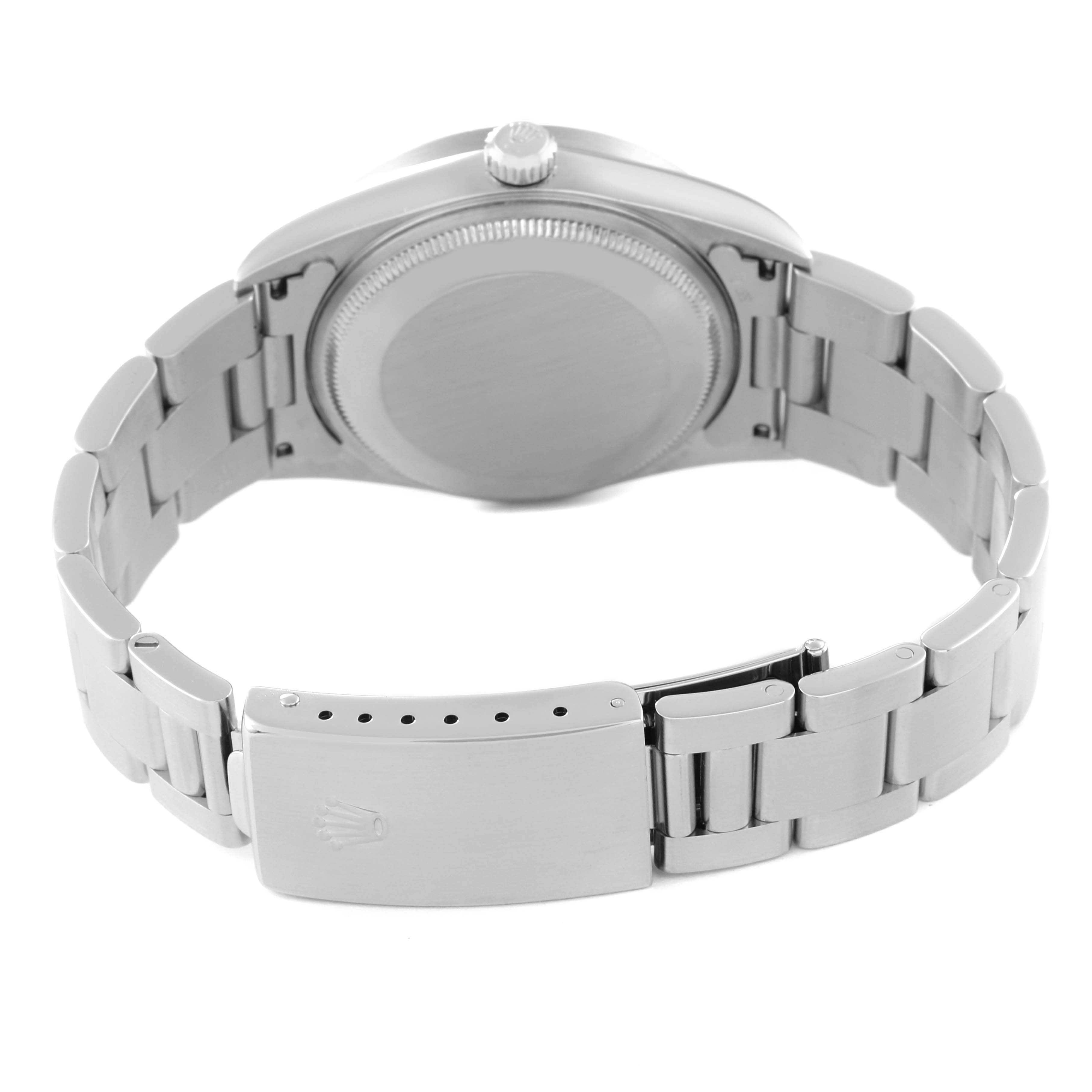 The image shows the back case and bracelet clasp of a Rolex Air-King 14010 Men's Stainless Steel Blue Dial 14010 Men's Stainless Steel Blue Dial watch at an angled rear view.