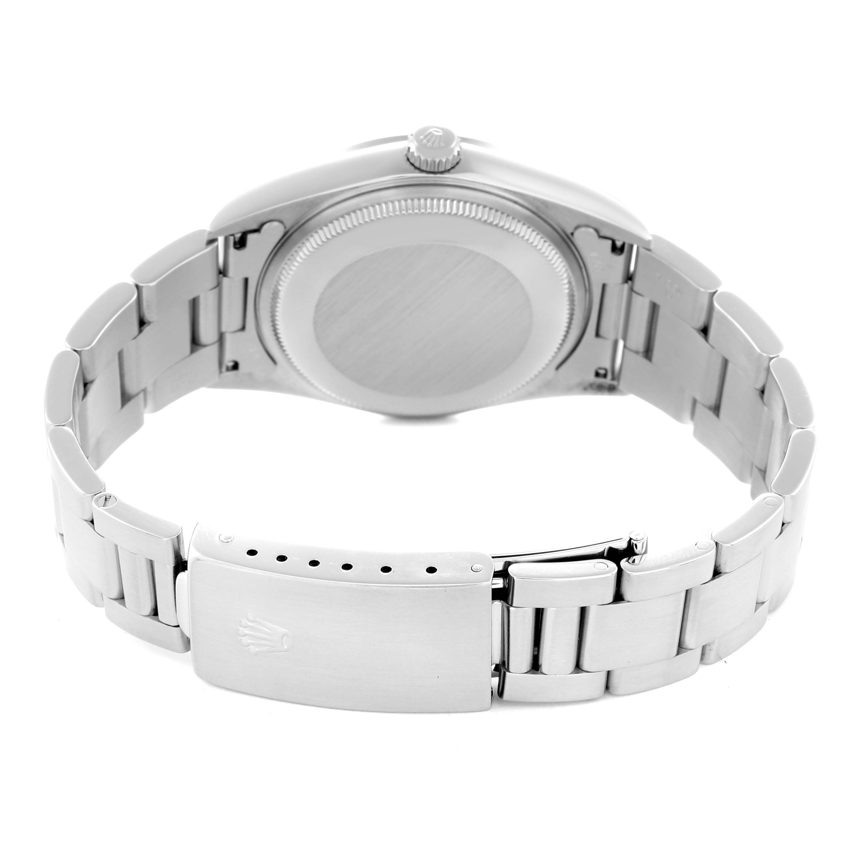 The image shows the back of a Rolex Air-King 14000 Men
s Stainless Steel Black Dial 14000 Men
s Stainless Steel Black Dial watch, featuring the case back and metal bracelet with the clasp visible.