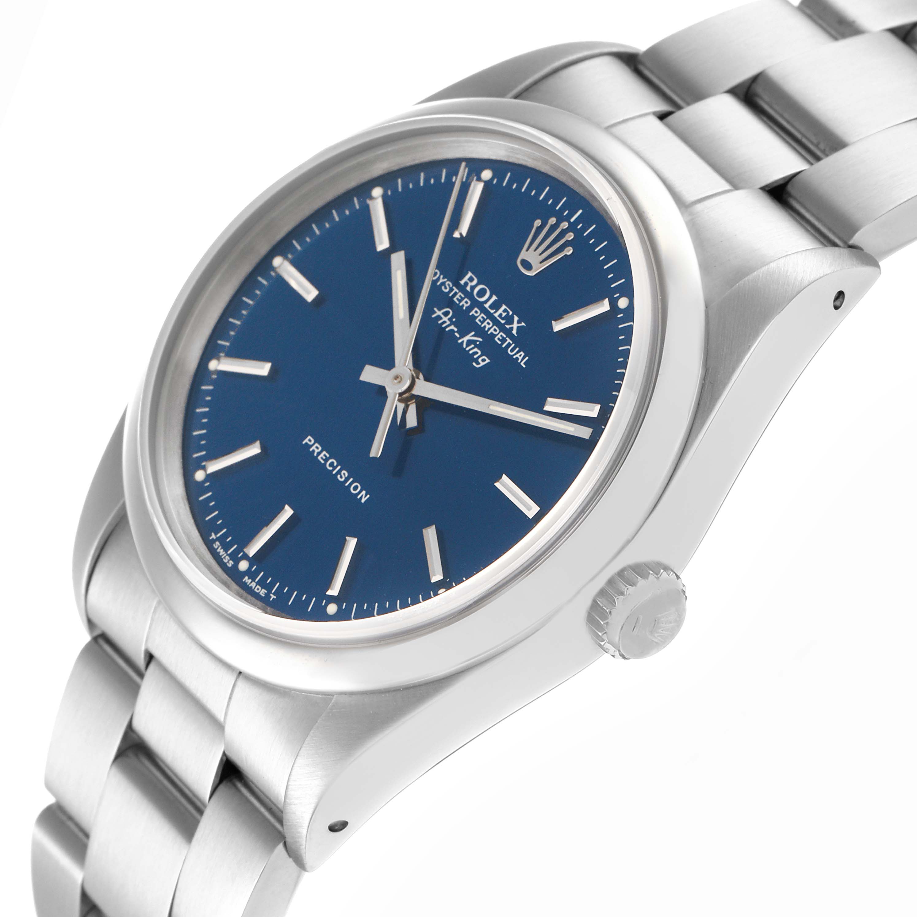The Rolex Air-King 14000 Men
s Stainless Steel Blue Dial 14000 Men
s Stainless Steel Blue Dial watch is shown at a tilted angle, displaying its face, crown, and bracelet.