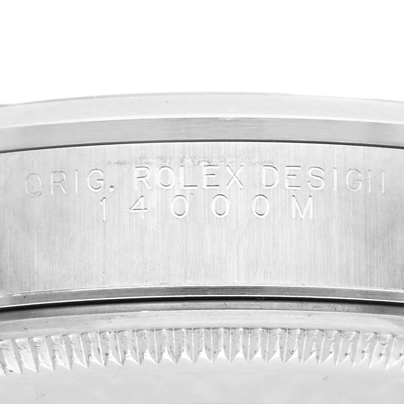 The image shows a close-up of the case side of a Rolex Air-King 14000 Men
s Stainless Steel Silver Dial 14000 Men
s Stainless Steel Silver Dial, highlighting the model number engraving.