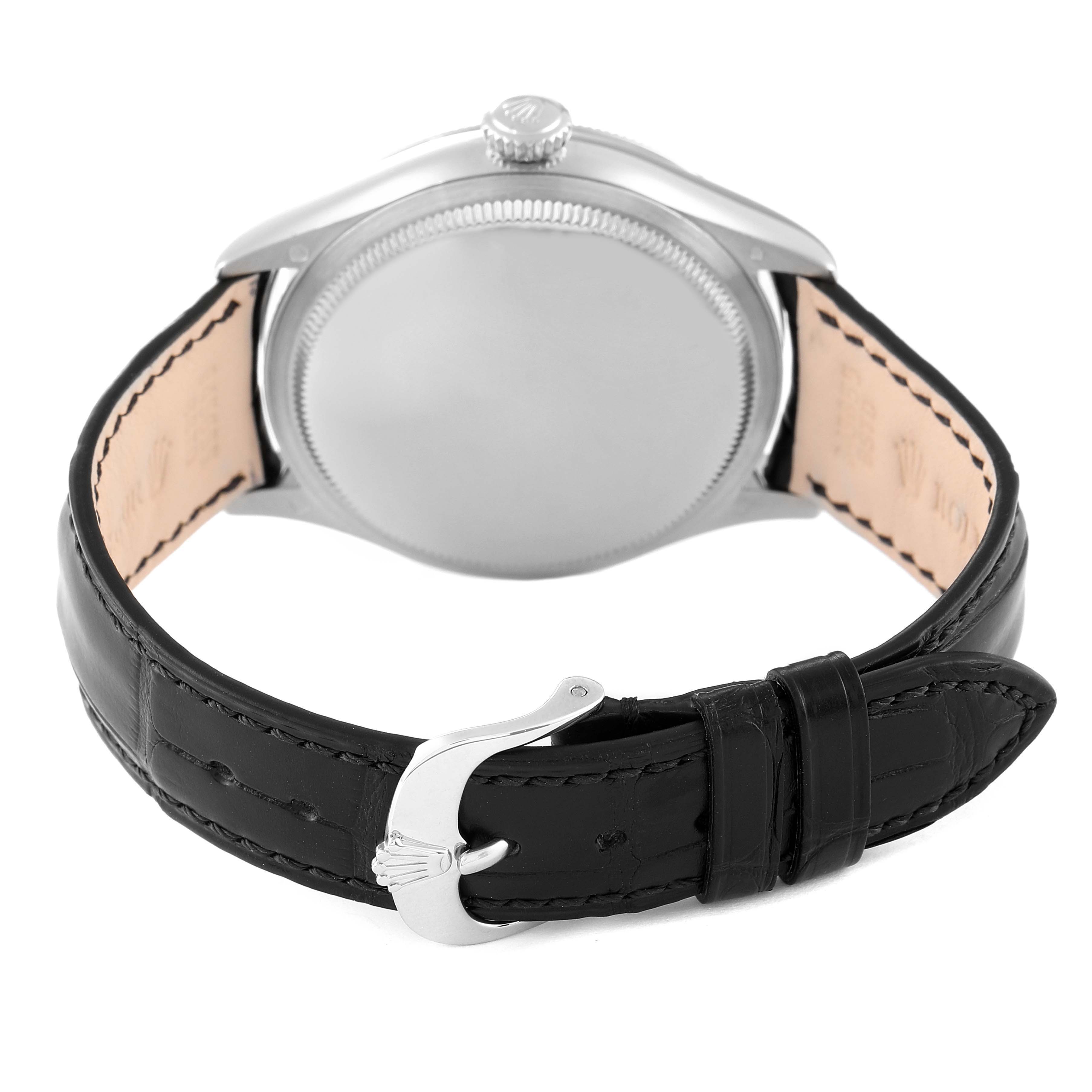 The image shows the back of a Rolex Cellini 50509 Men's White Gold White Dial 50509 Men's White Gold White Dial watch with its black leather strap and stainless steel clasp.