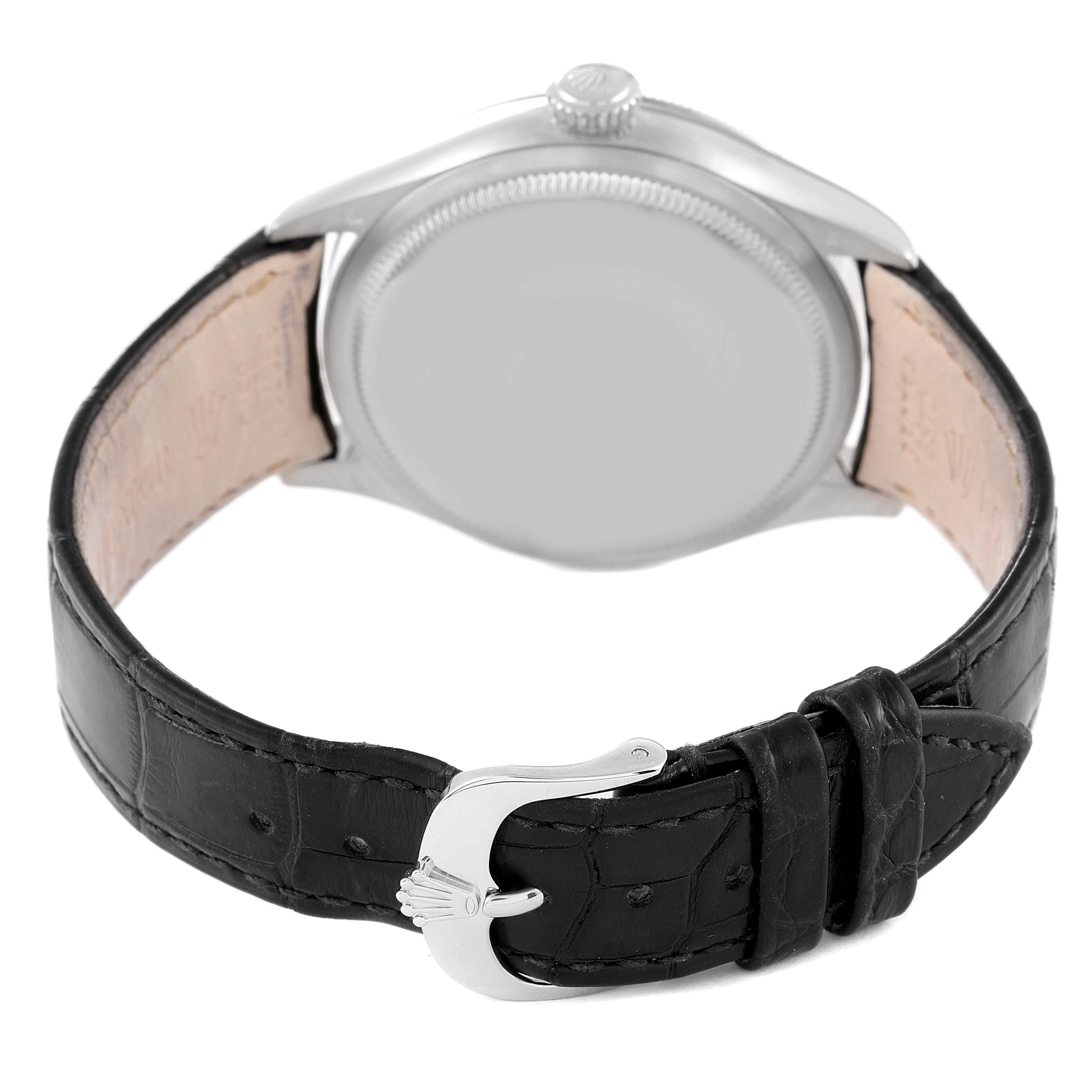 The image shows the back of a Rolex Cellini 50509 Men's White Gold White Dial 50509 Men's White Gold White Dial watch, featuring its case back, crown, and leather strap with a clasp.