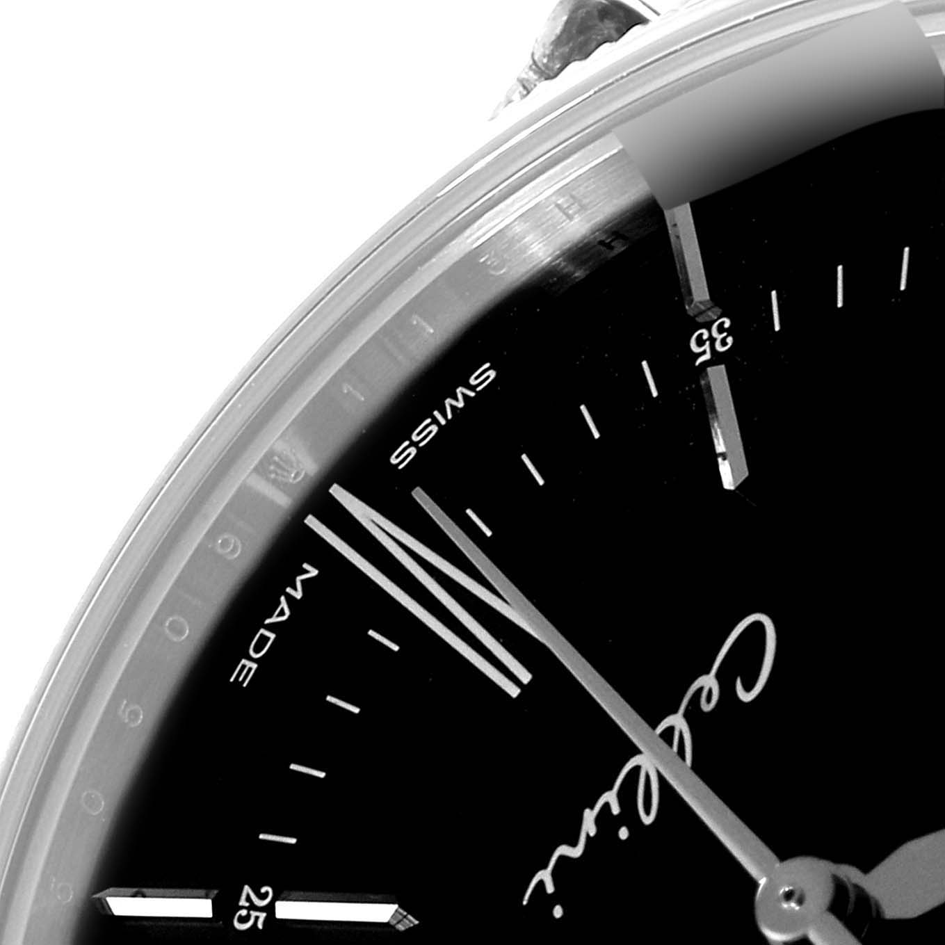 This image shows a close-up of the dial's upper left portion of a Rolex Cellini 50509 Men's White Gold Black Dial 50509 Men's White Gold Black Dial watch.