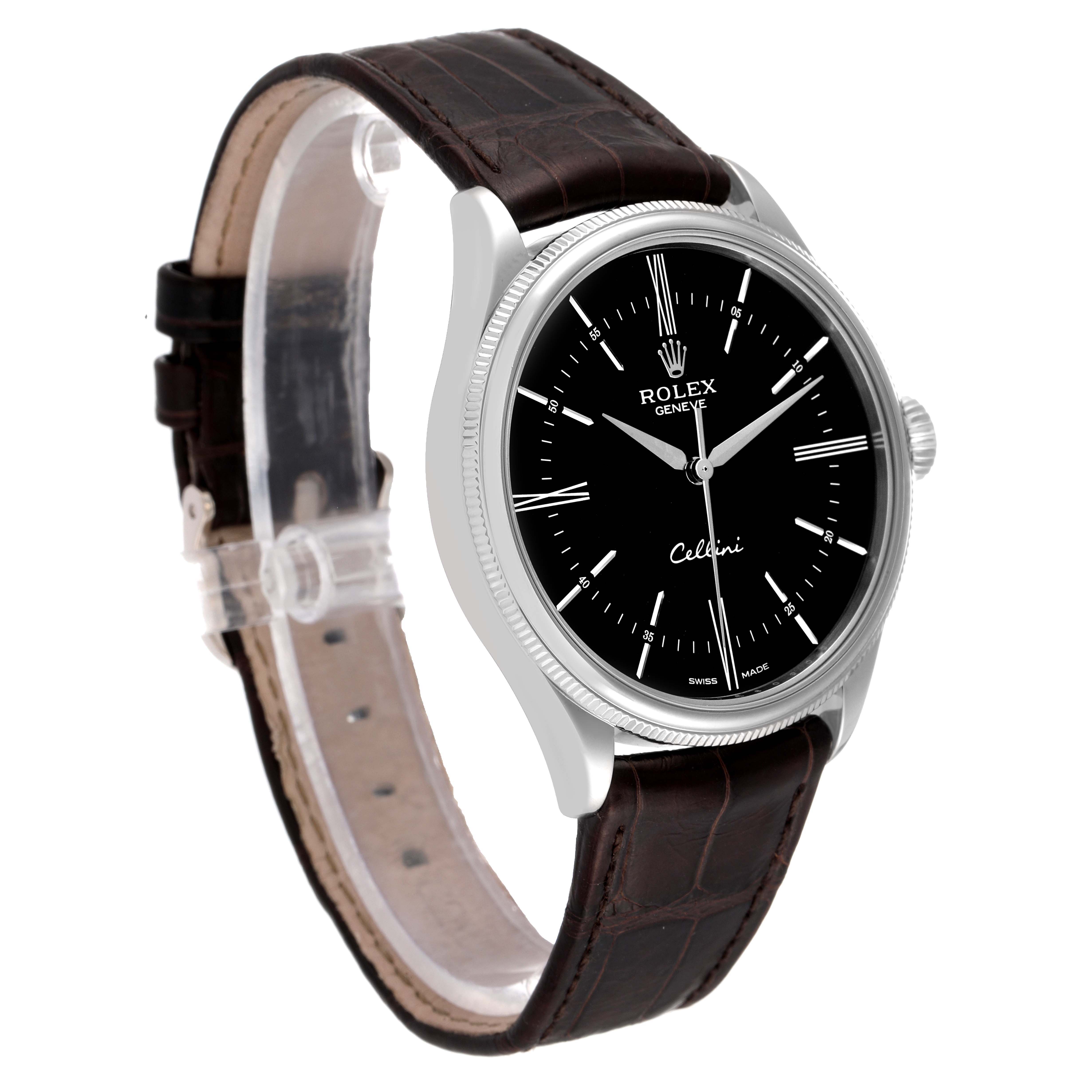 The image shows a Rolex Cellini 50509 Men's White Gold Black Dial 50509 Men's White Gold Black Dial watch from a 3/4 angle, highlighting its black dial, silver case, and brown leather strap.