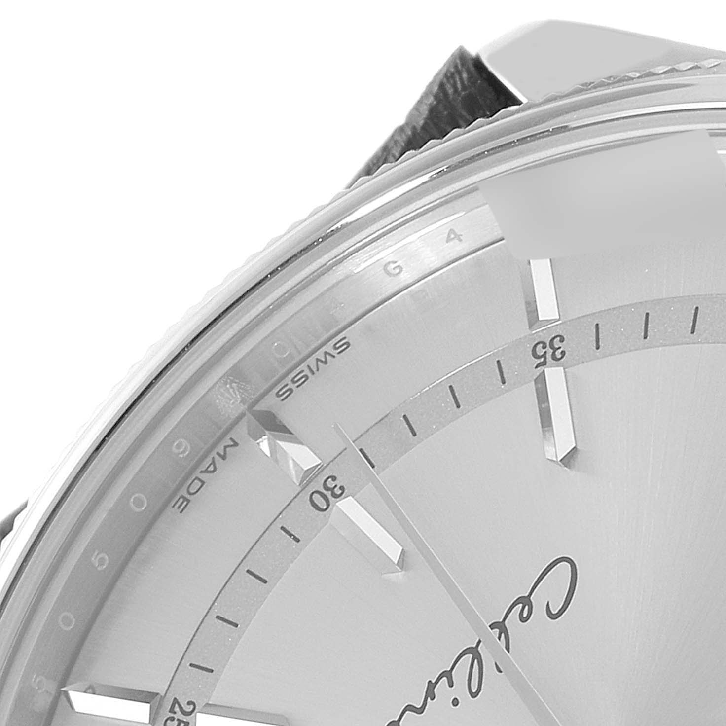 The image shows a close-up of the dial and part of the bezel of a Rolex Cellini 50509 Men
s Stainless Steel Silver Dial 50509 Men
s Stainless Steel Silver Dial watch, focusing on the minute markers and hands.