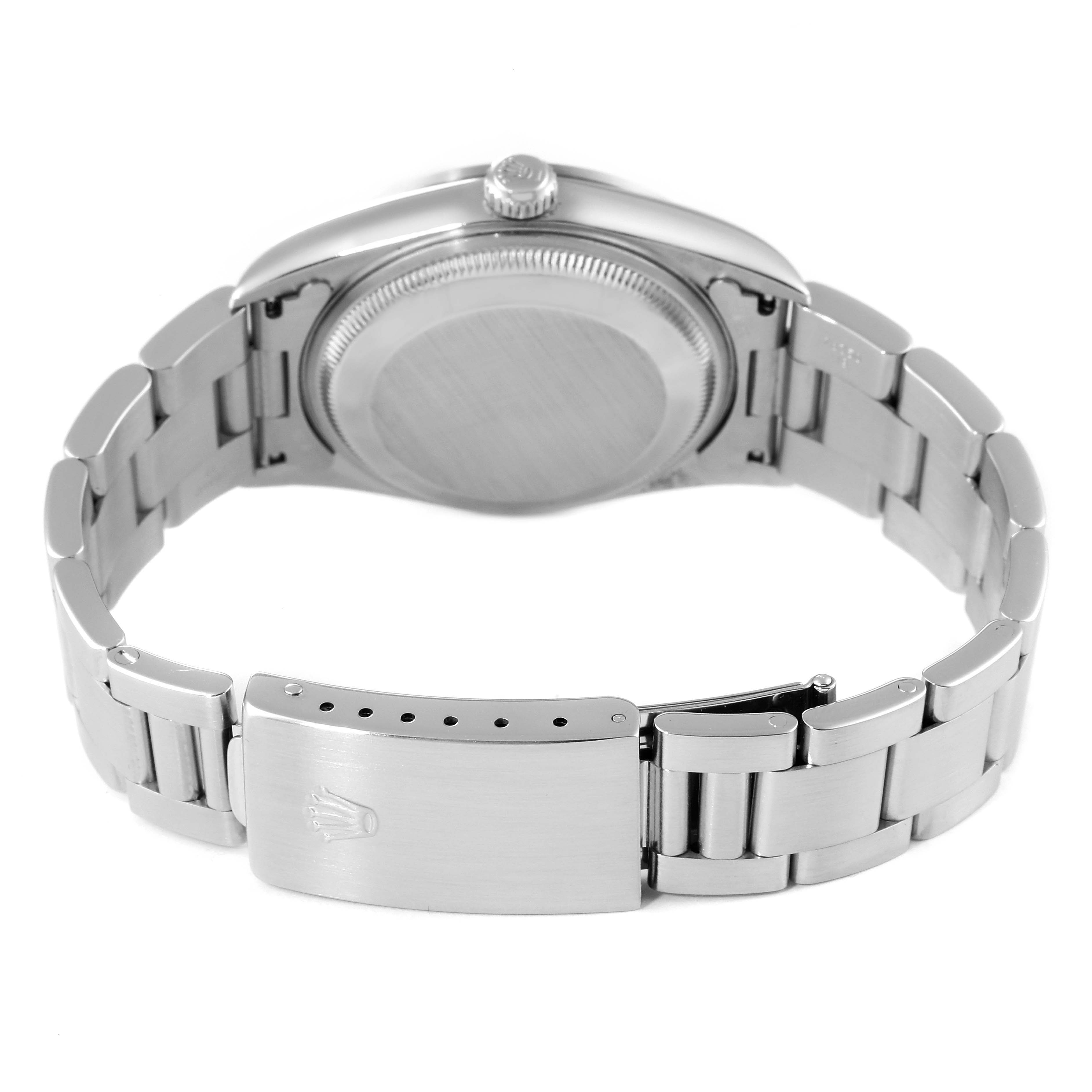 The image shows the back angle of the Rolex Date 15200 Men's Stainless Steel Pink Dial 15200 Men's Stainless Steel Pink Dial watch focusing on the case back and metal bracelet with clasp.