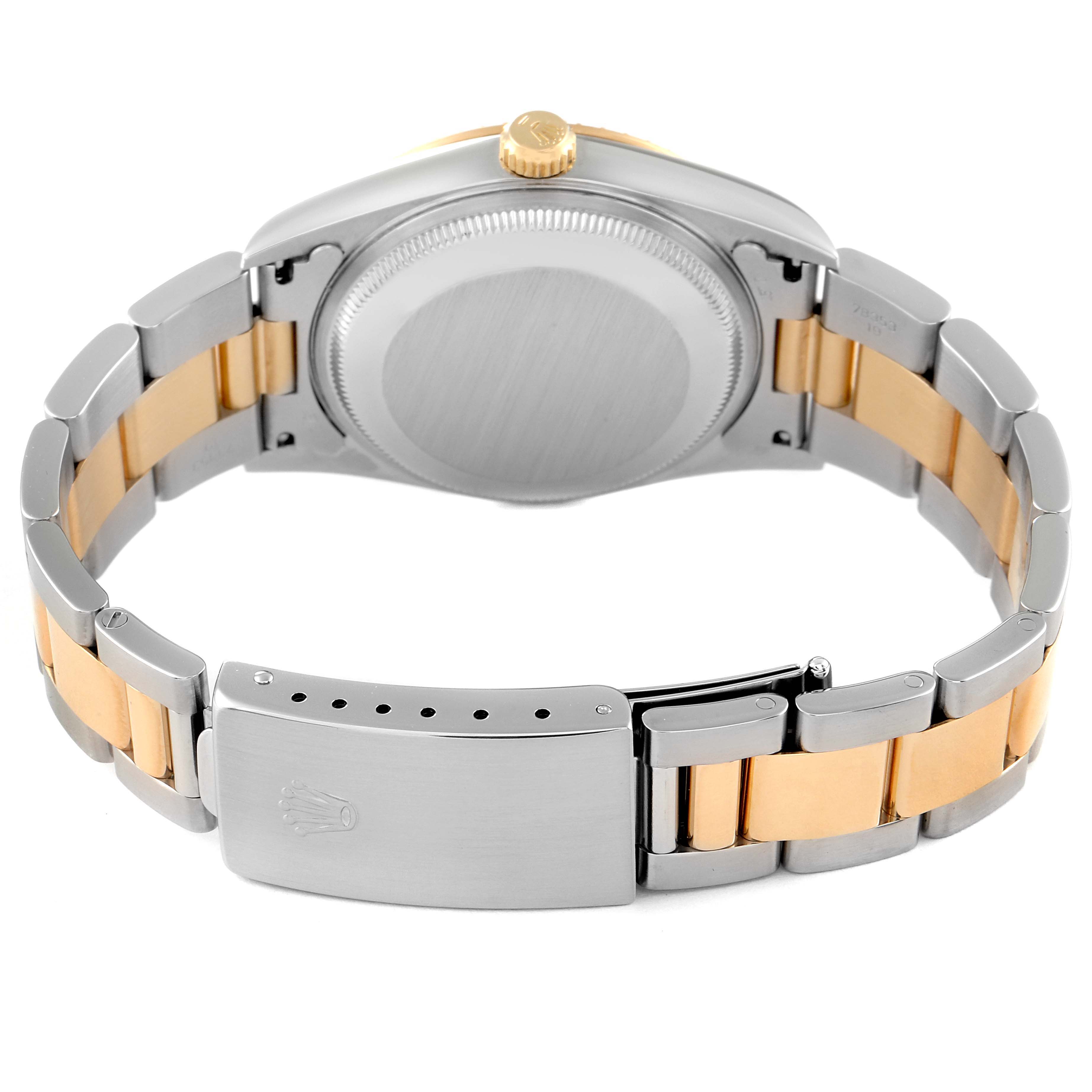 This is the back view of a Rolex Date 15223 Men's Steel and Gold (two tone) Grey Dial 15223 Men's Steel and Gold (two tone) Grey Dial model watch, showing the caseback and two-tone bracelet with a closed clasp.
