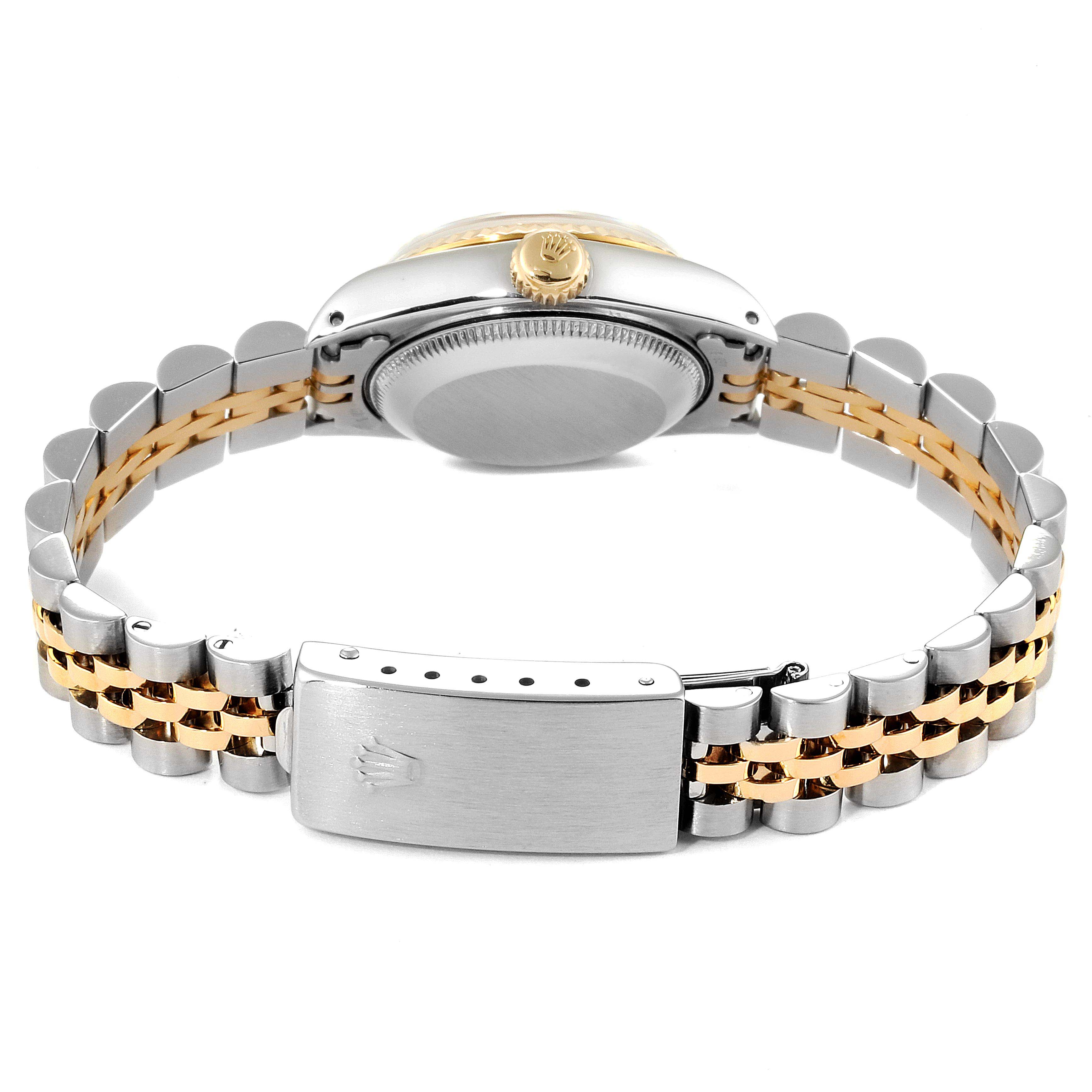 The image shows the back and side of a Rolex Datejust 69173 Women
s Steel and Gold (two tone) Champagne Dial 69173 Women
s Steel and Gold (two tone) Champagne Dial watch, highlighting the bracelet and clasp.
