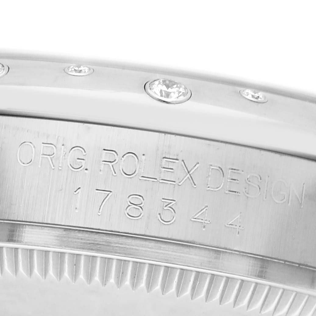 This close-up of the Rolex Datejust 178344 Women's Stainless Steel Brown Dial shows the edge of the bezel with diamonds and engraved model details.