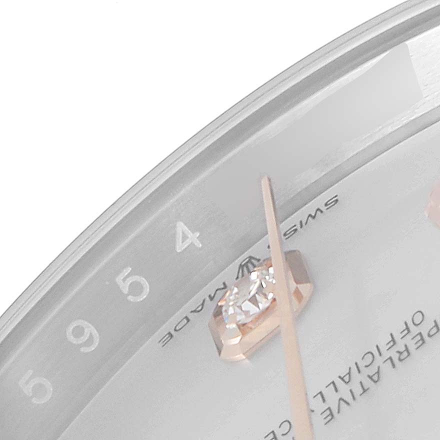 This close-up image of a Rolex Datejust 126281 Men
s Steel and Gold (two tone) Mother of Pearl Dial 126281 Men
s Steel and Gold (two tone) Mother of Pearl Dial watch shows the 4 o
clock marker, part of the dial, and the edge of the case.