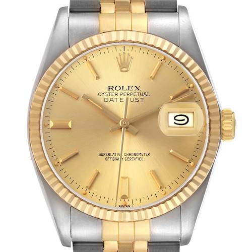 The Rolex Datejust 16013 Men's Steel and Gold (two tone) Champagne Dial watch is shown from a front angle, highlighting the dial, fluted bezel, and part of the bracelet.