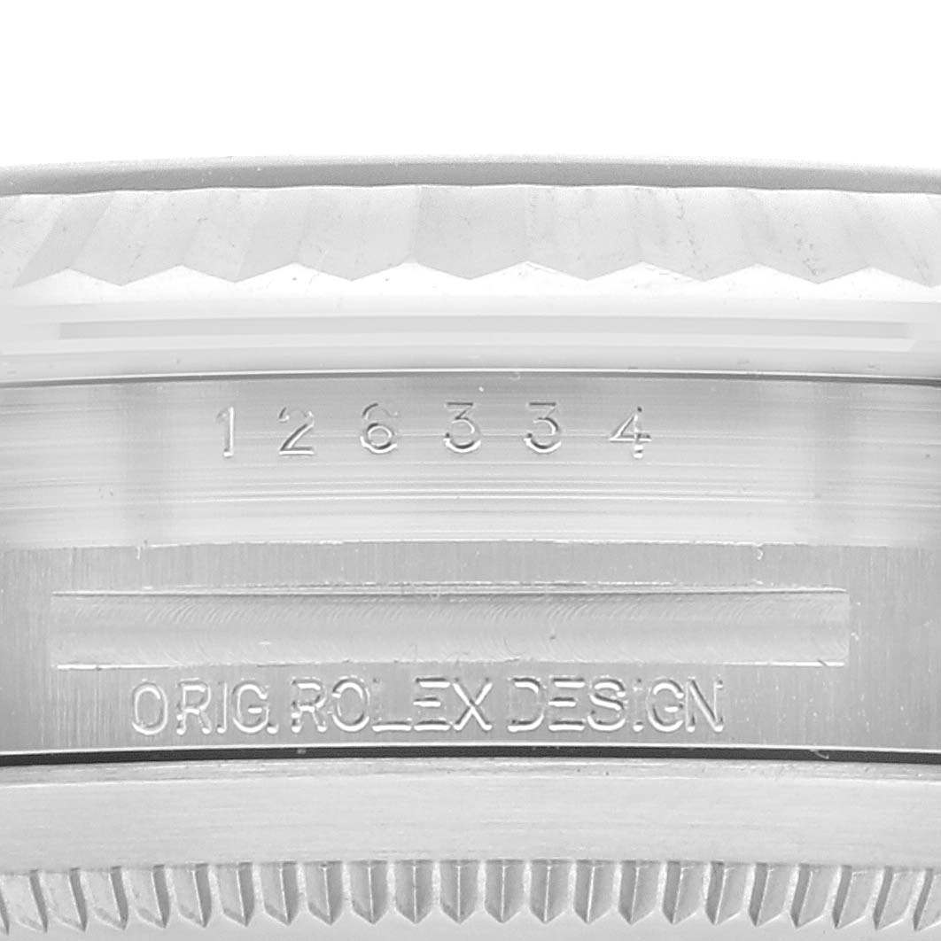 This image shows a close-up of the Rolex Datejust 41 126334 Men
s Stainless Steel Blue Dial 126334 Men
s Stainless Steel Blue Dial model focusing on the case and engravings.