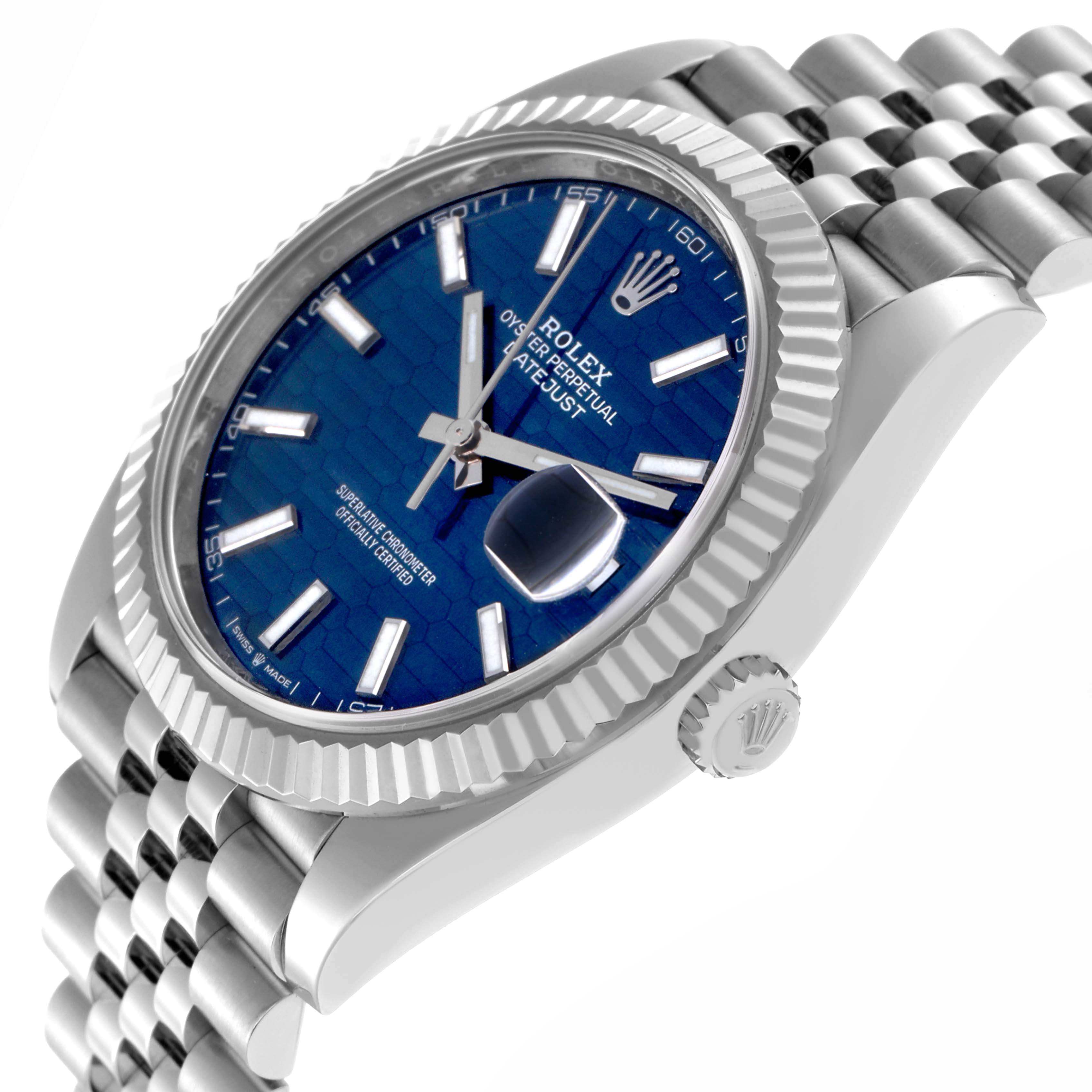 The Rolex Datejust 41 126334 Men
s Stainless Steel Blue Dial 126334 Men
s Stainless Steel Blue Dial is shown at a slight angle, highlighting the bezel, crown, bracelet, and blue dial.