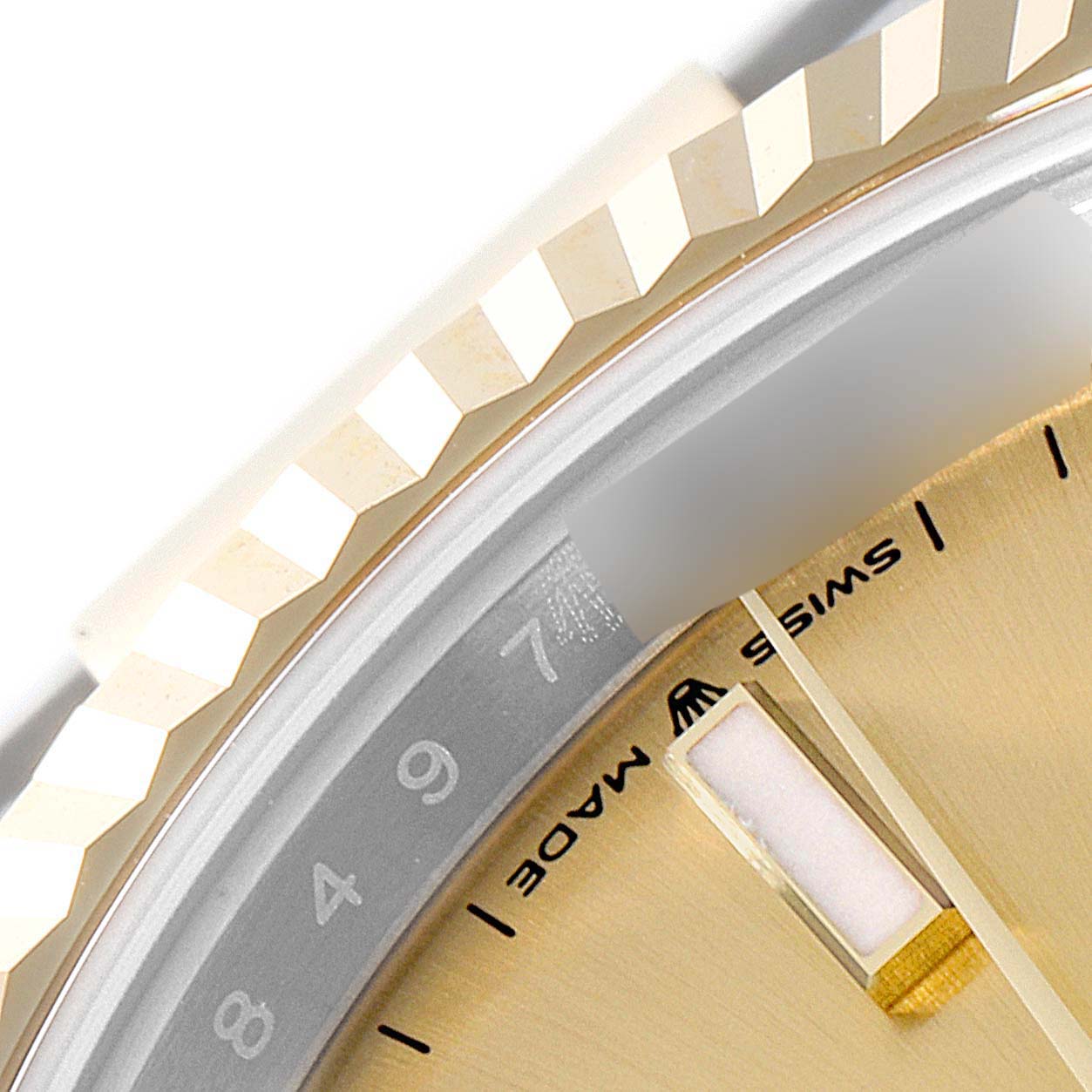 The image shows a close-up of the bezel, part of the dial, and the rehaut of a Rolex Datejust 41 126333 Men's Steel and Gold (two tone) Champagne Dial 126333 Men's Steel and Gold (two tone) Champagne Dial watch.