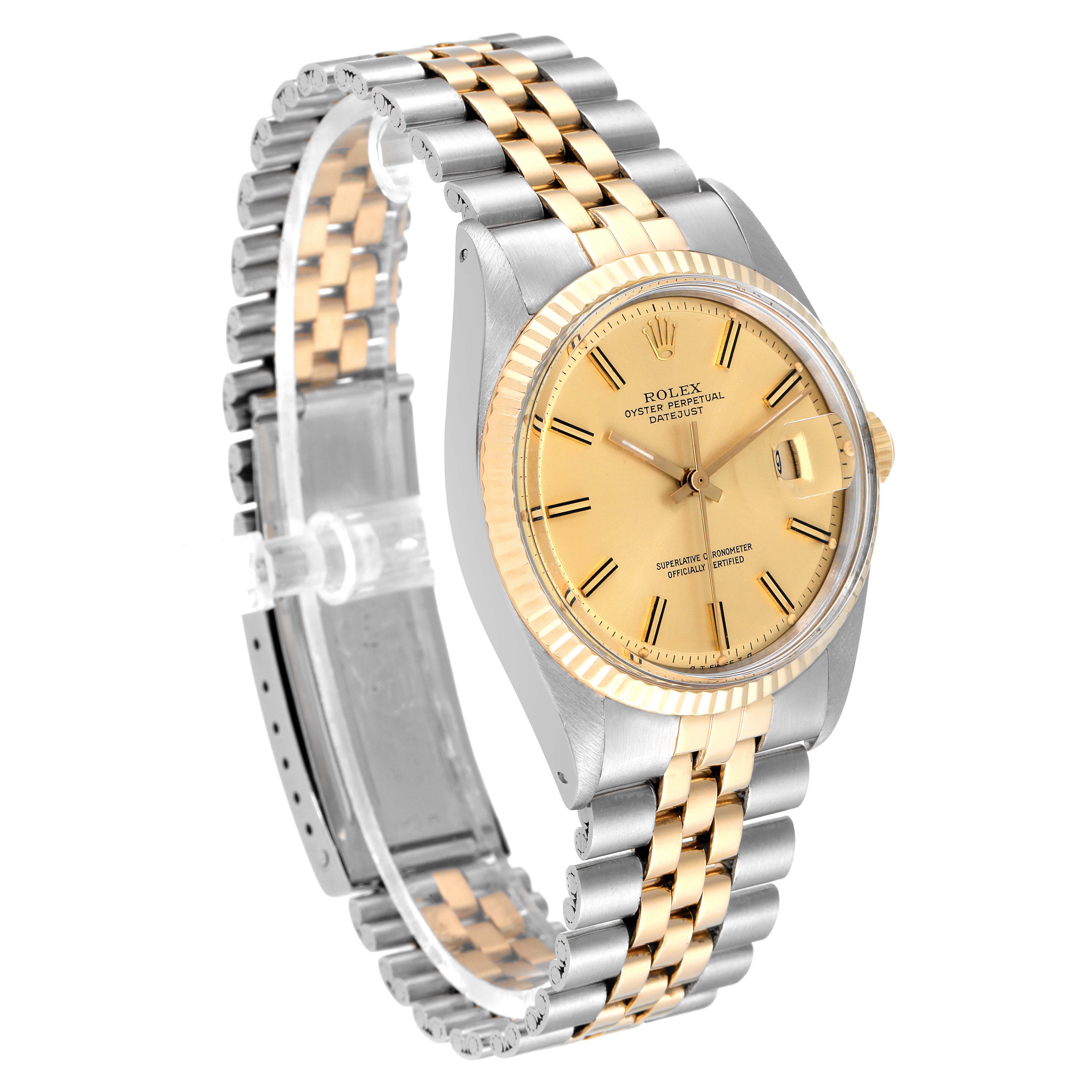 The Rolex Datejust 1601 Men
s Steel and Gold (two tone) Champagne Dial 1601 Men
s Steel and Gold (two tone) Champagne Dial watch is shown at a three-quarter angle, highlighting its gold and silver bracelet, dial, and fluted bezel.
