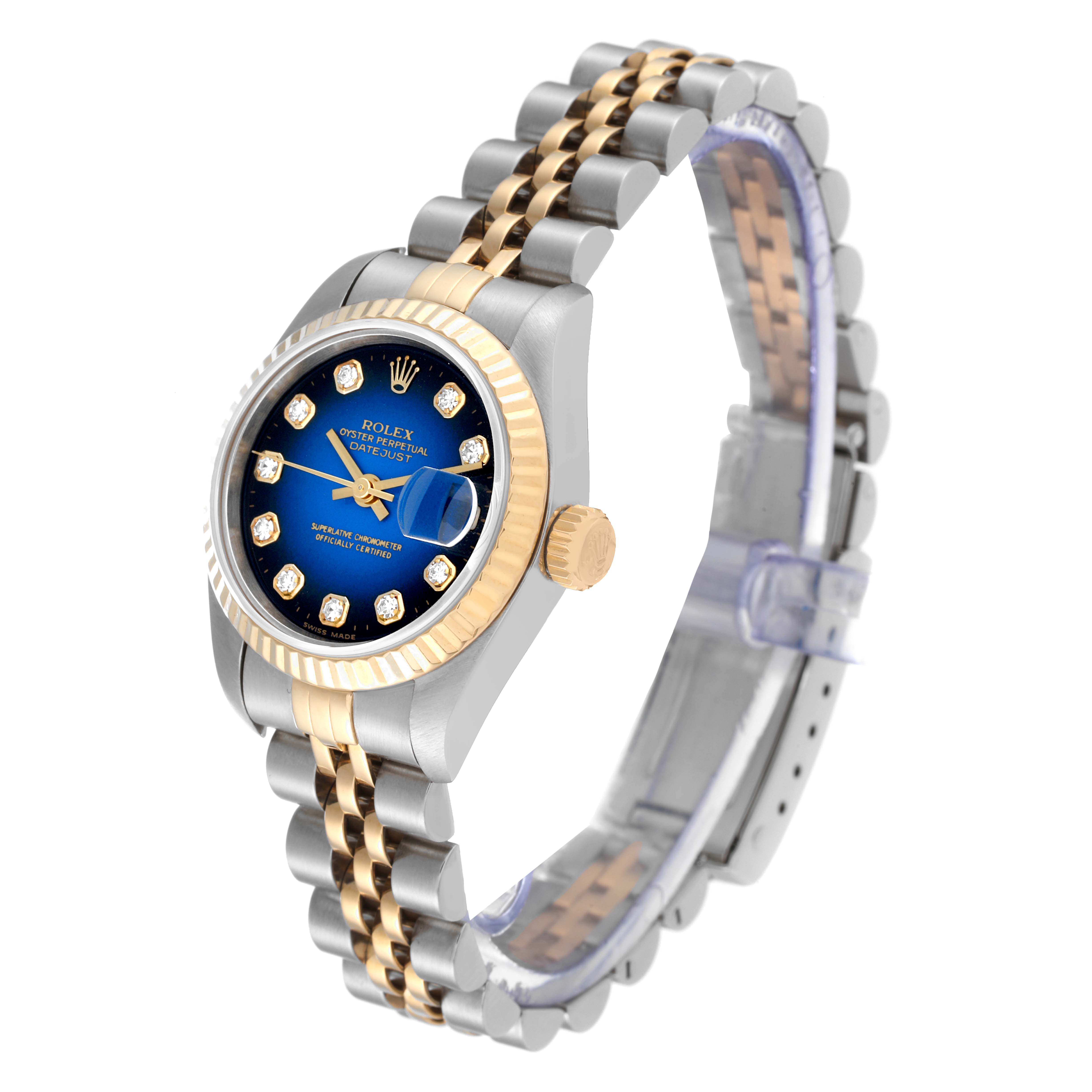 This Rolex Datejust 69173 Women's Steel and Gold (two tone) Blue Dial 69173 Women's Steel and Gold (two tone) Blue Dial watch is shown at a slight angle, highlighting the blue dial, jubilee bracelet, and fluted bezel.