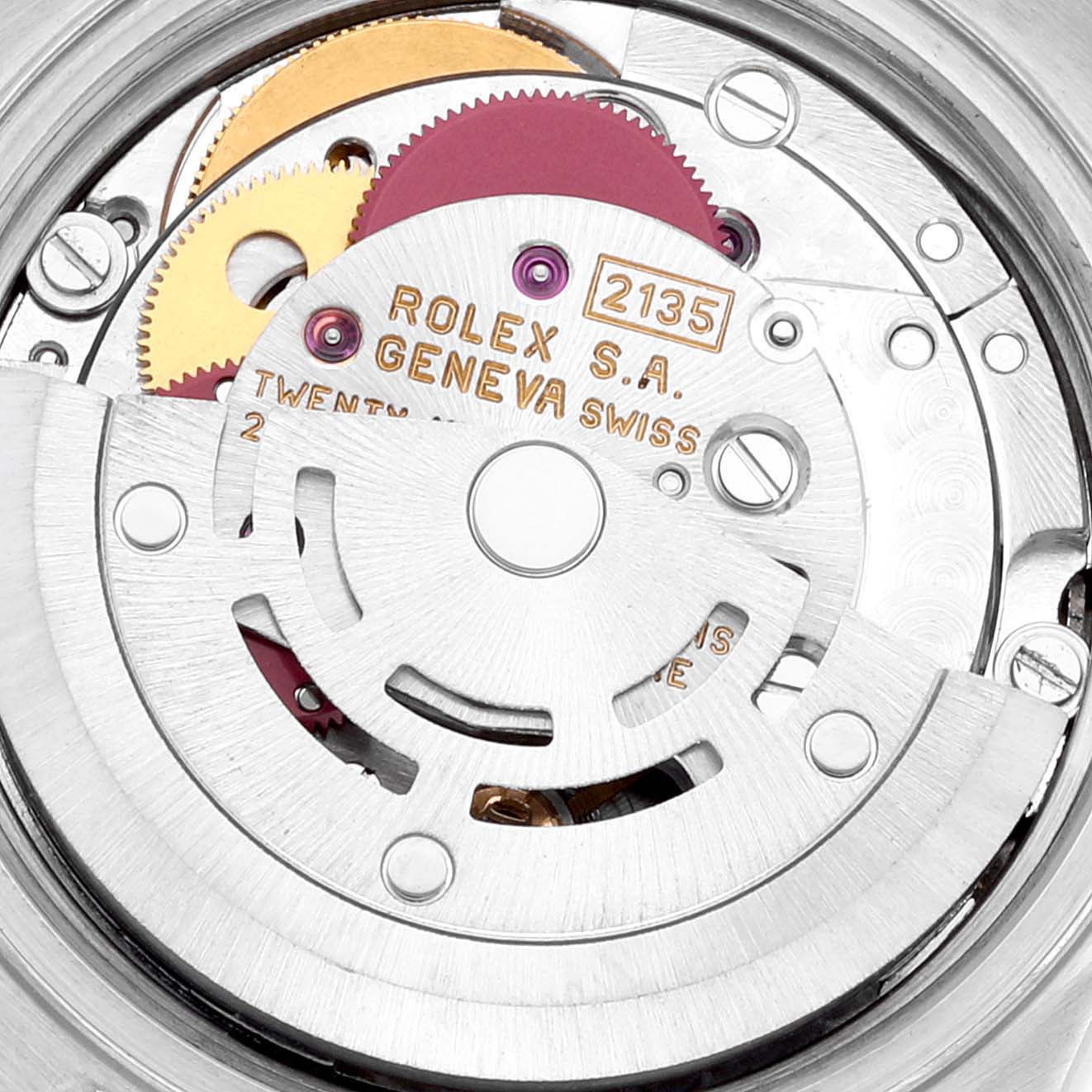 This image shows the detailed internal mechanism of a Rolex Datejust 69173 Women's Steel and Gold (two tone) Blue Dial 69173 Women's Steel and Gold (two tone) Blue Dial watch, highlighting its gears and inscriptions.