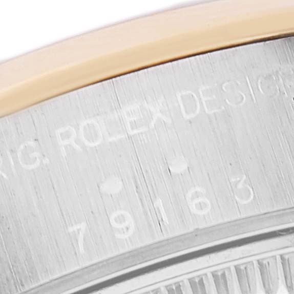 The image shows a close-up of the case back of a Rolex Datejust 79163 Women's Steel and Gold (two tone) White Dial 79163 Women's Steel and Gold (two tone) White Dial watch, revealing the model number 79163.