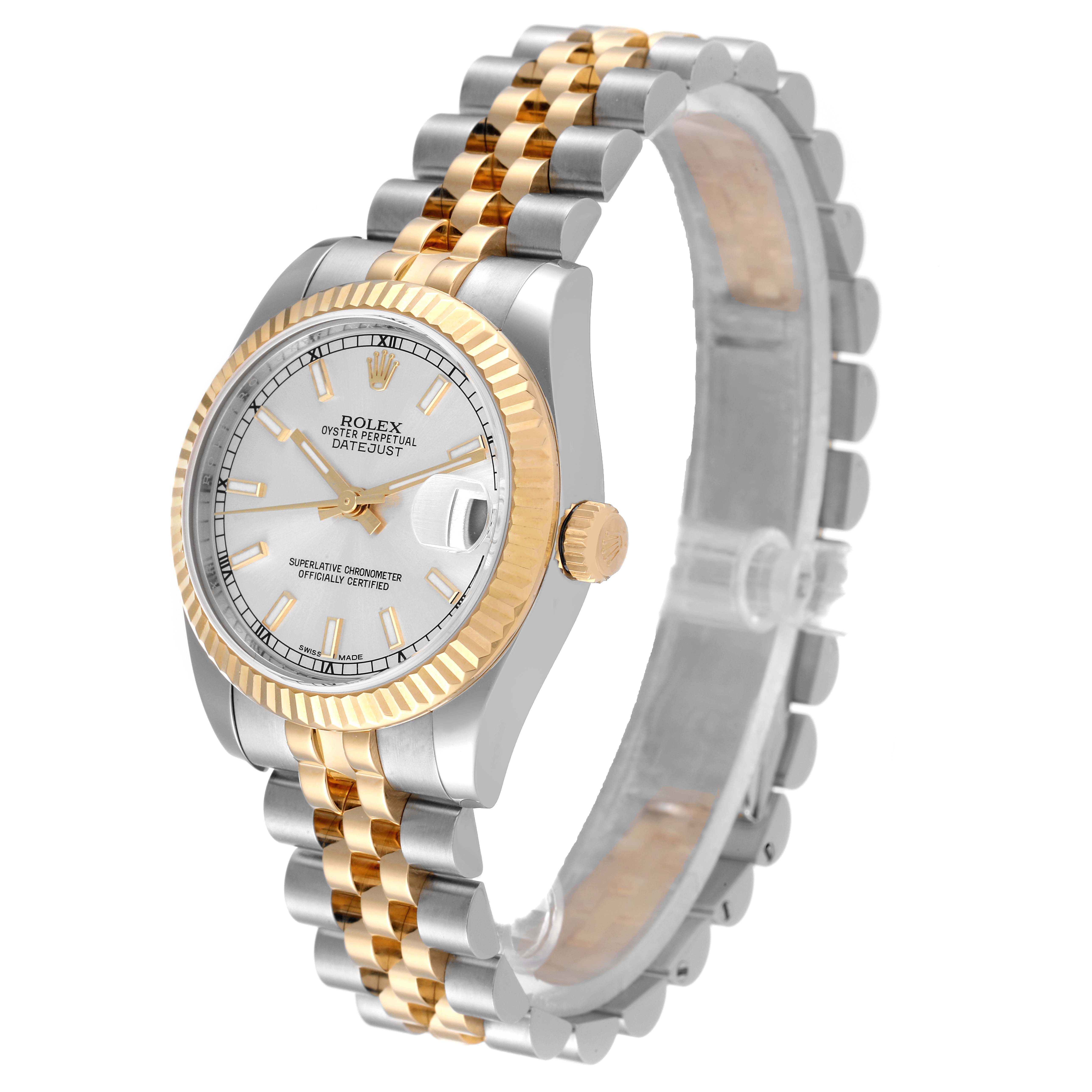 The image shows a mid-size Rolex Datejust watch from a side angle, highlighting its two-tone bracelet, crown, and fluted bezel.
