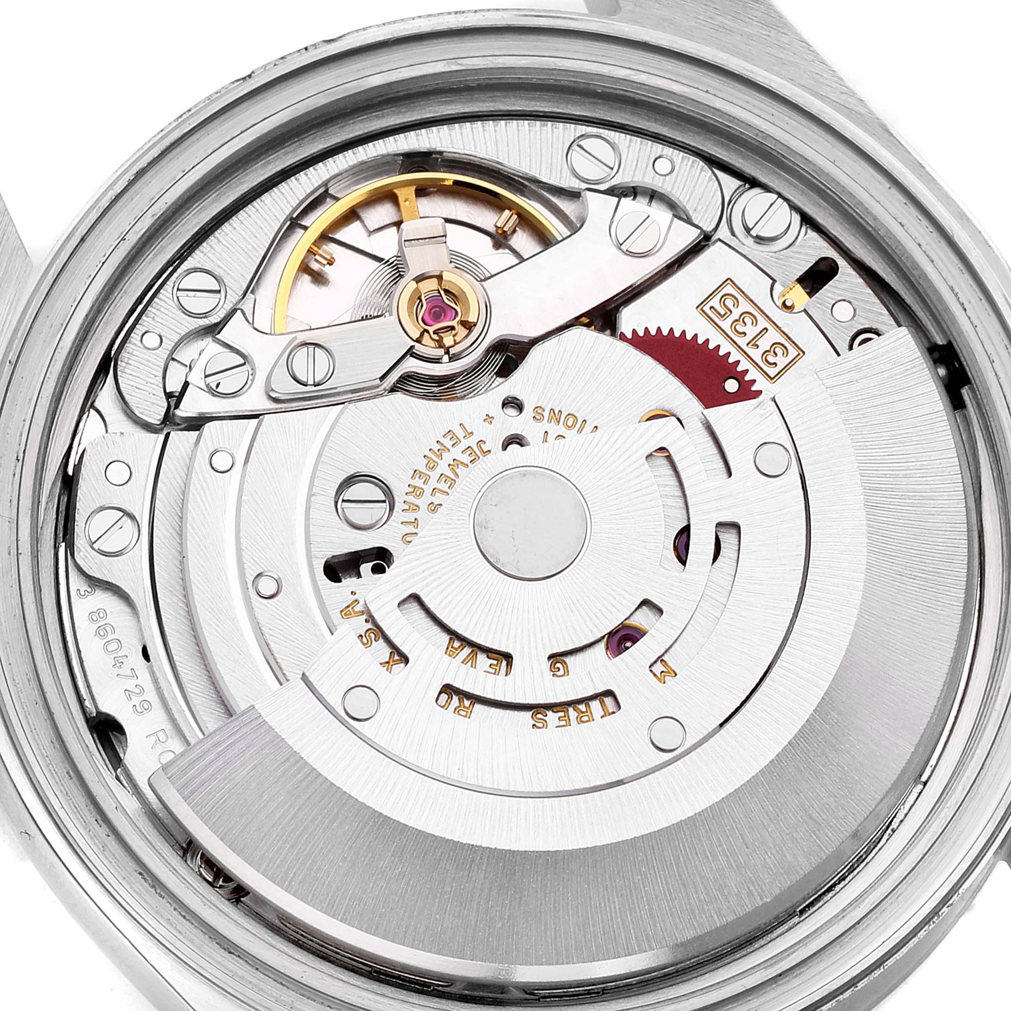 This image shows the internal mechanism from the back of a Rolex Datejust 16233 Men's Steel and Gold (two tone) Blue Dial 16233 Men's Steel and Gold (two tone) Blue Dial watch, highlighting its intricate movement parts.