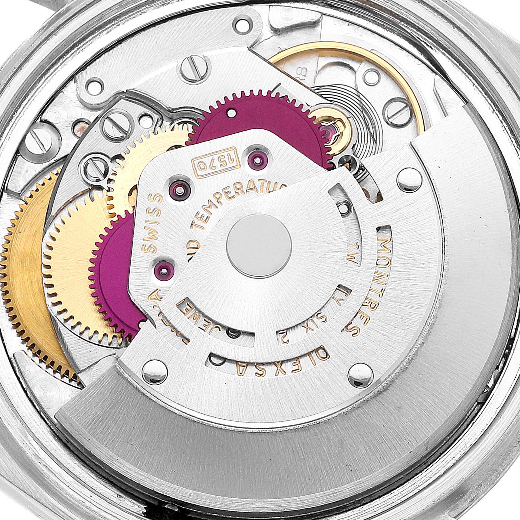 This image shows a close-up view of the movement and internal mechanics of the Rolex Datejust 1601 Men
s Stainless Steel Silver Dial 1601 Men
s Stainless Steel Silver Dial model.