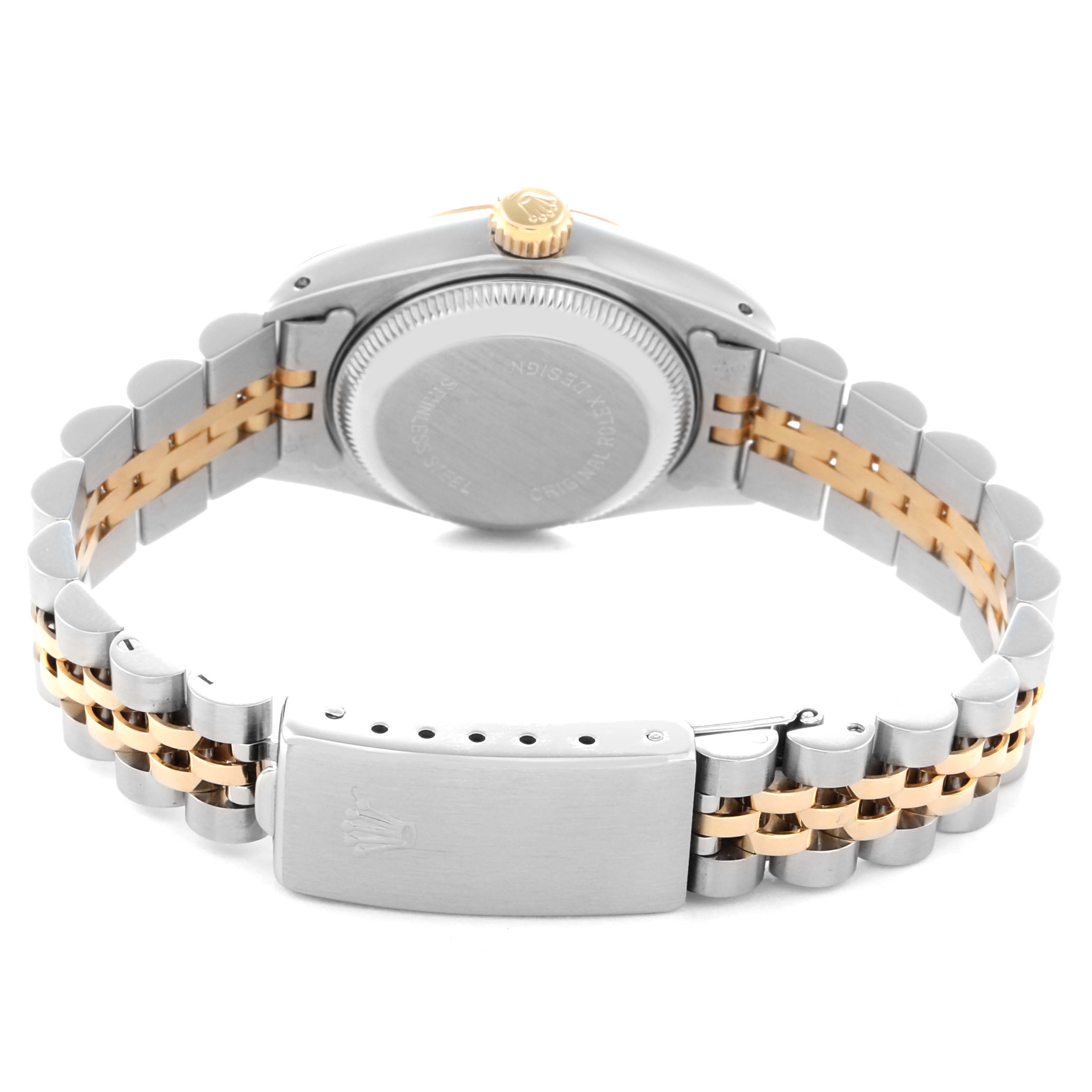 The image shows the back of a Rolex Datejust 69173 Women
s Steel and Gold (two tone) Champagne Dial 69173 Women
s Steel and Gold (two tone) Champagne Dial, highlighting the case back, crown, and two-tone bracelet with clasp.