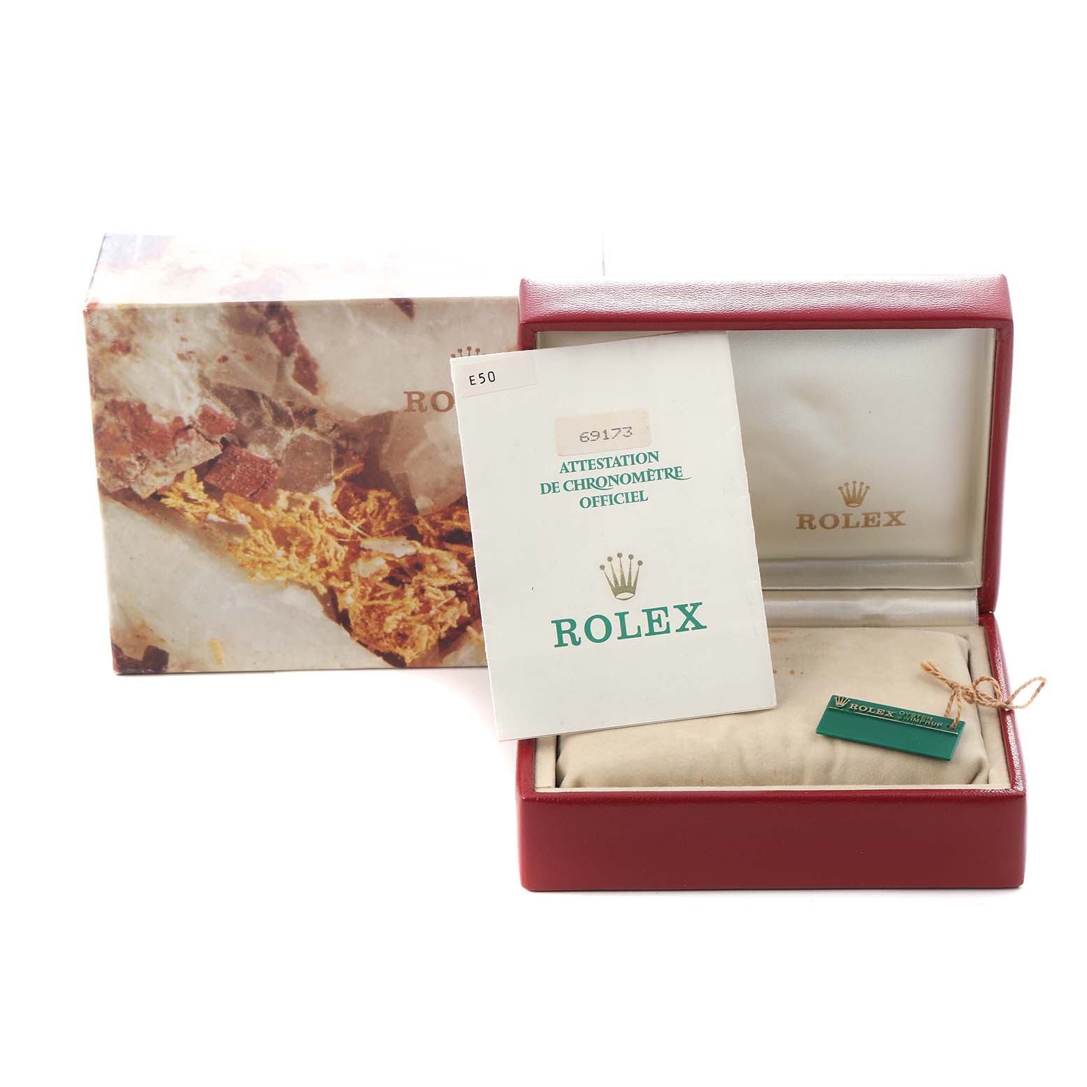 The image shows a Rolex Datejust 69173 Women
s Steel and Gold (two tone) Silver Dial 69173 Women
s Steel and Gold (two tone) Silver Dial box with official documents and a tag, viewed from the front.