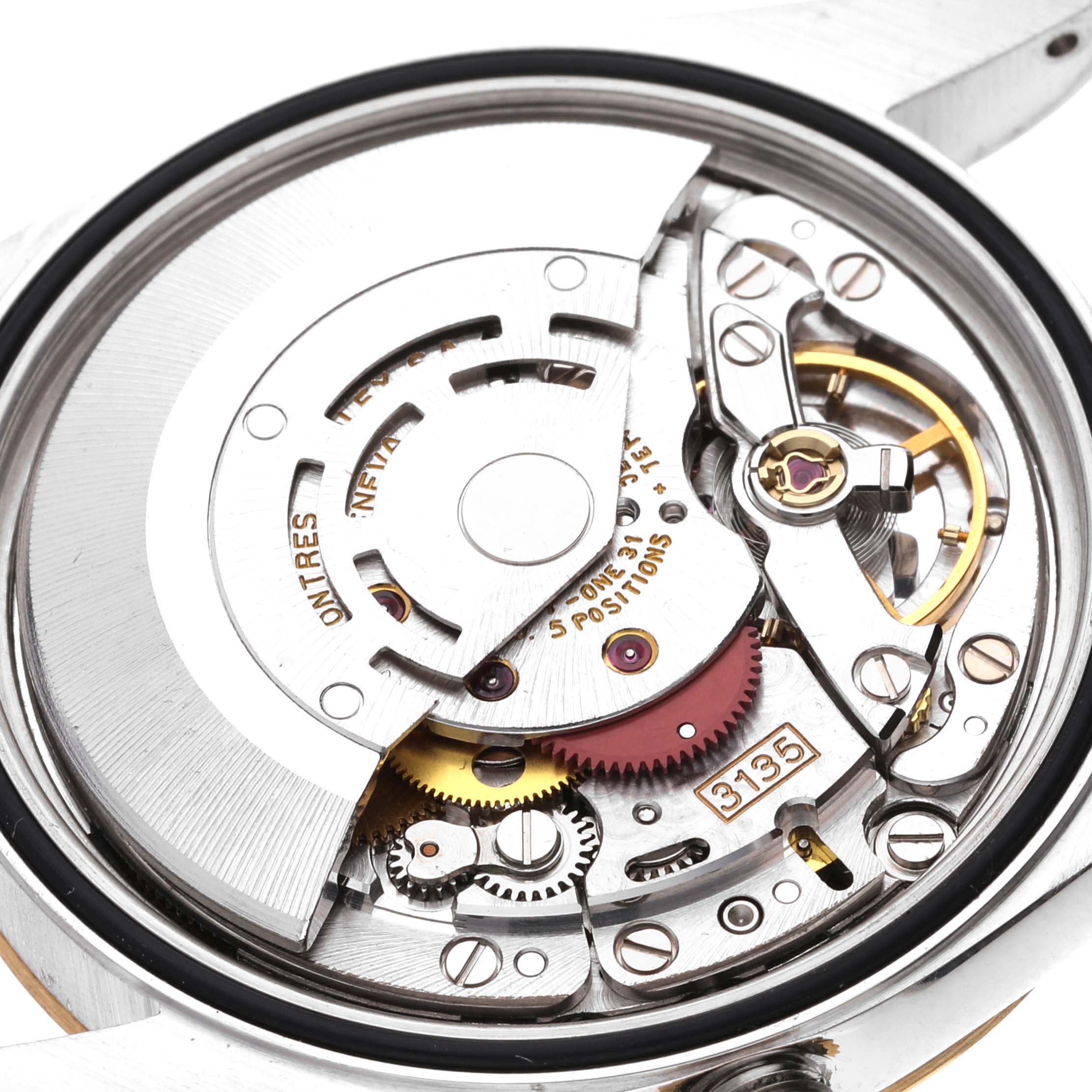 This image shows the internal mechanical movement of a Rolex Datejust 16233 Men's Steel and Gold (two tone) Black Dial 16233 Men's Steel and Gold (two tone) Black Dial watch from a close angle.