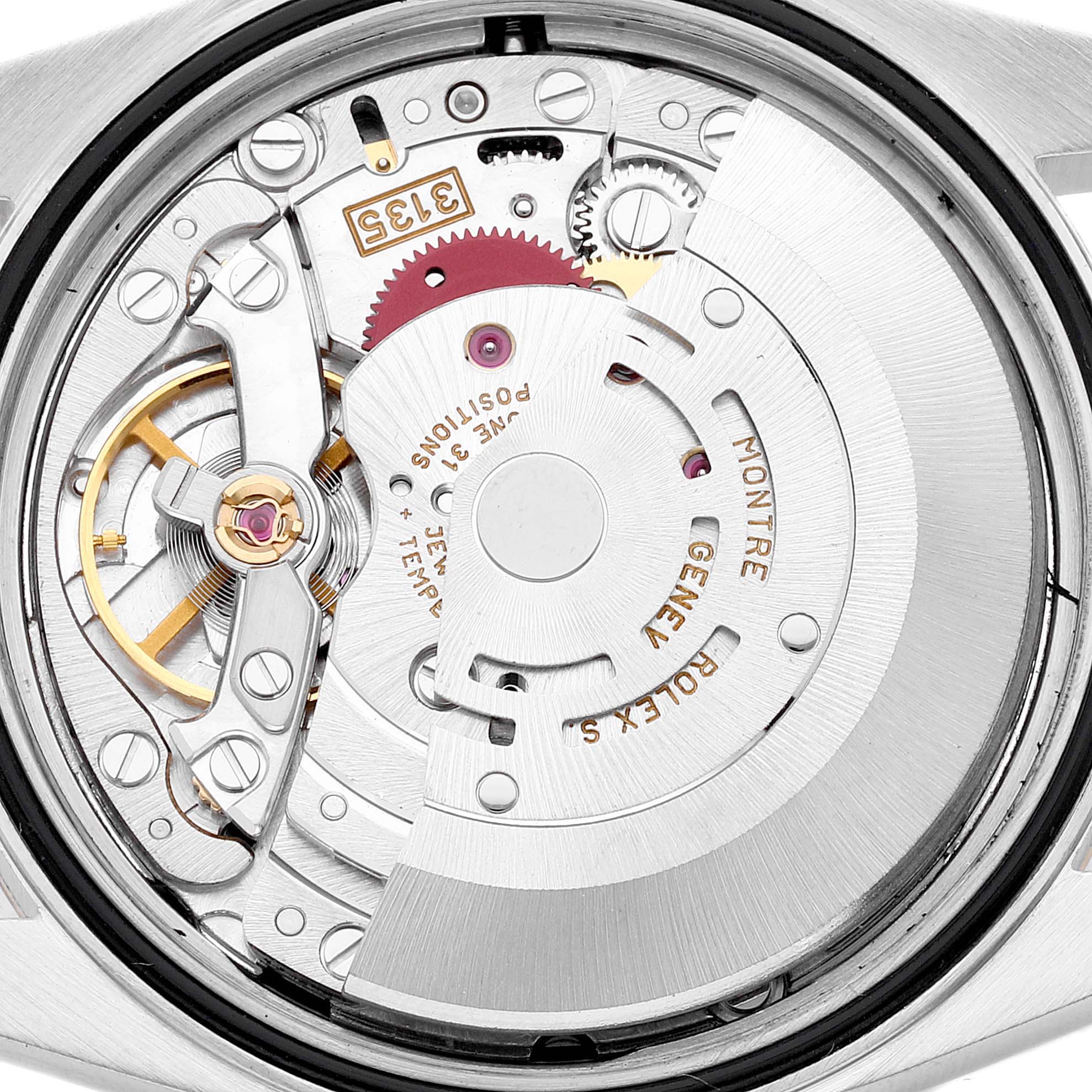 This image shows the internal movement of a Rolex Datejust 16233 Men's Steel and Gold (two tone) Black Dial 16233 Men's Steel and Gold (two tone) Black Dial watch taken from a rear angle.